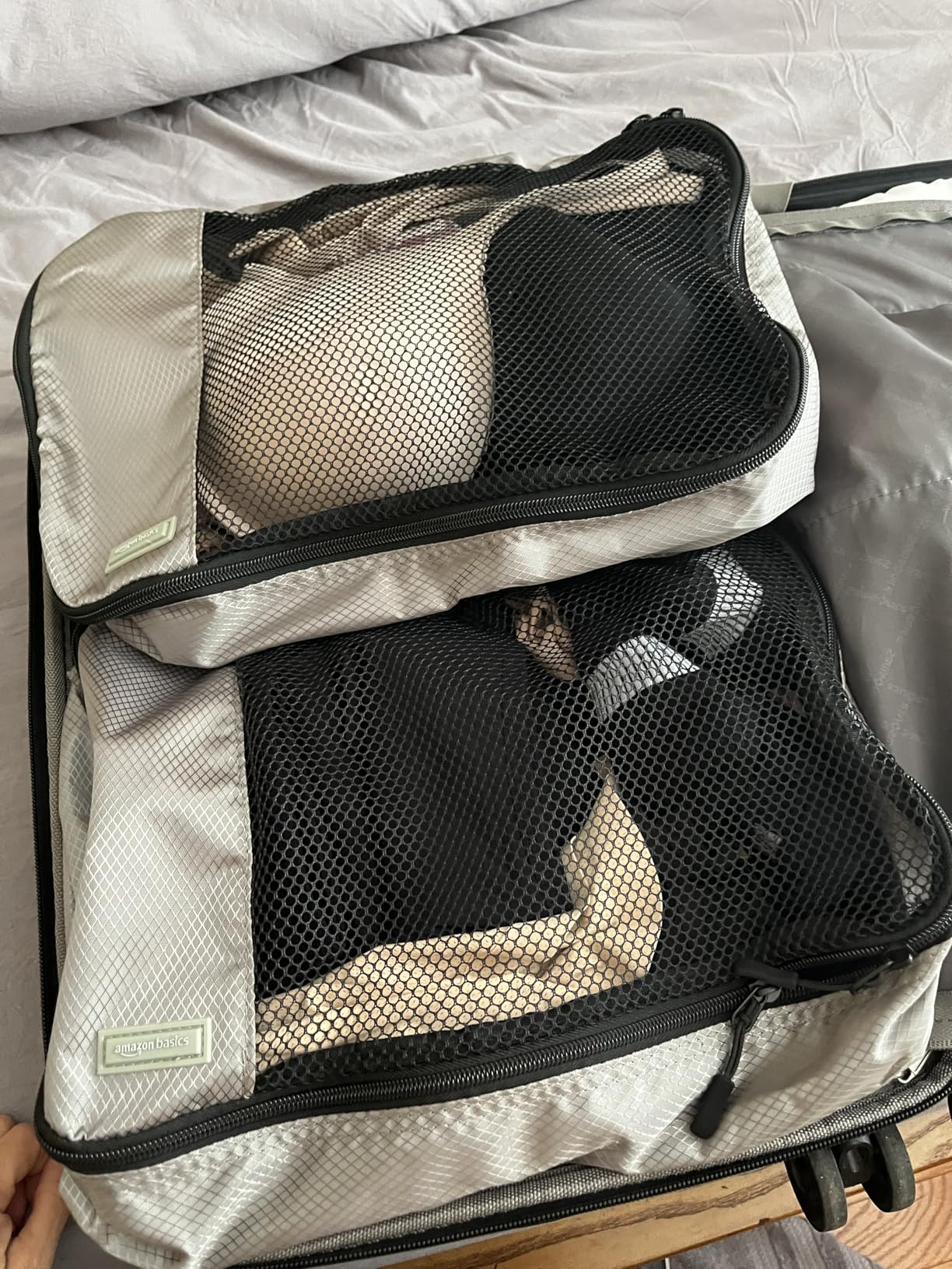 Amazon Essentials 4-Piece Packing Cubes Travel Accessories Set, Space-Saving Luggage Organizer with Double Zipper, Mesh Top Panel, Medium, Gray customer photo 1