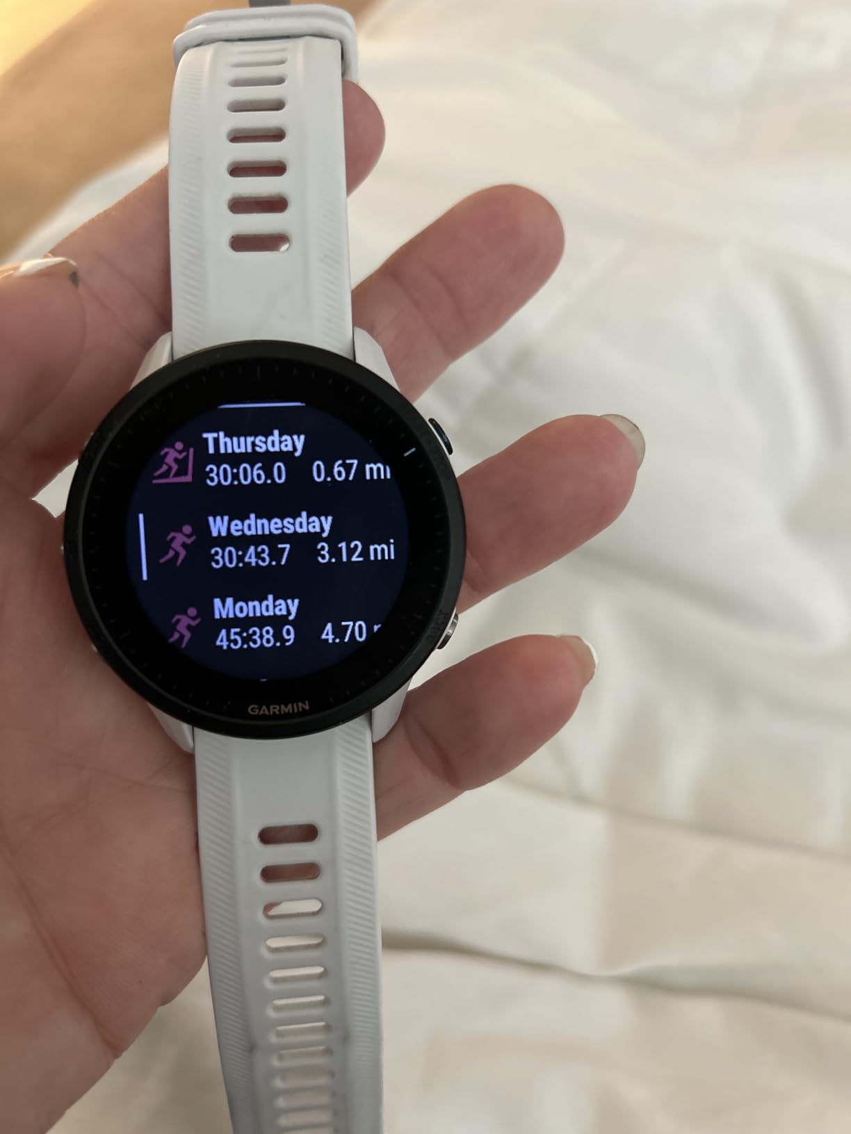 Garmin Forerunner 955, GPS Running Smartwatch, Tailored to Triathletes, Long-Lasting Battery, Whitestone customer photo 2
