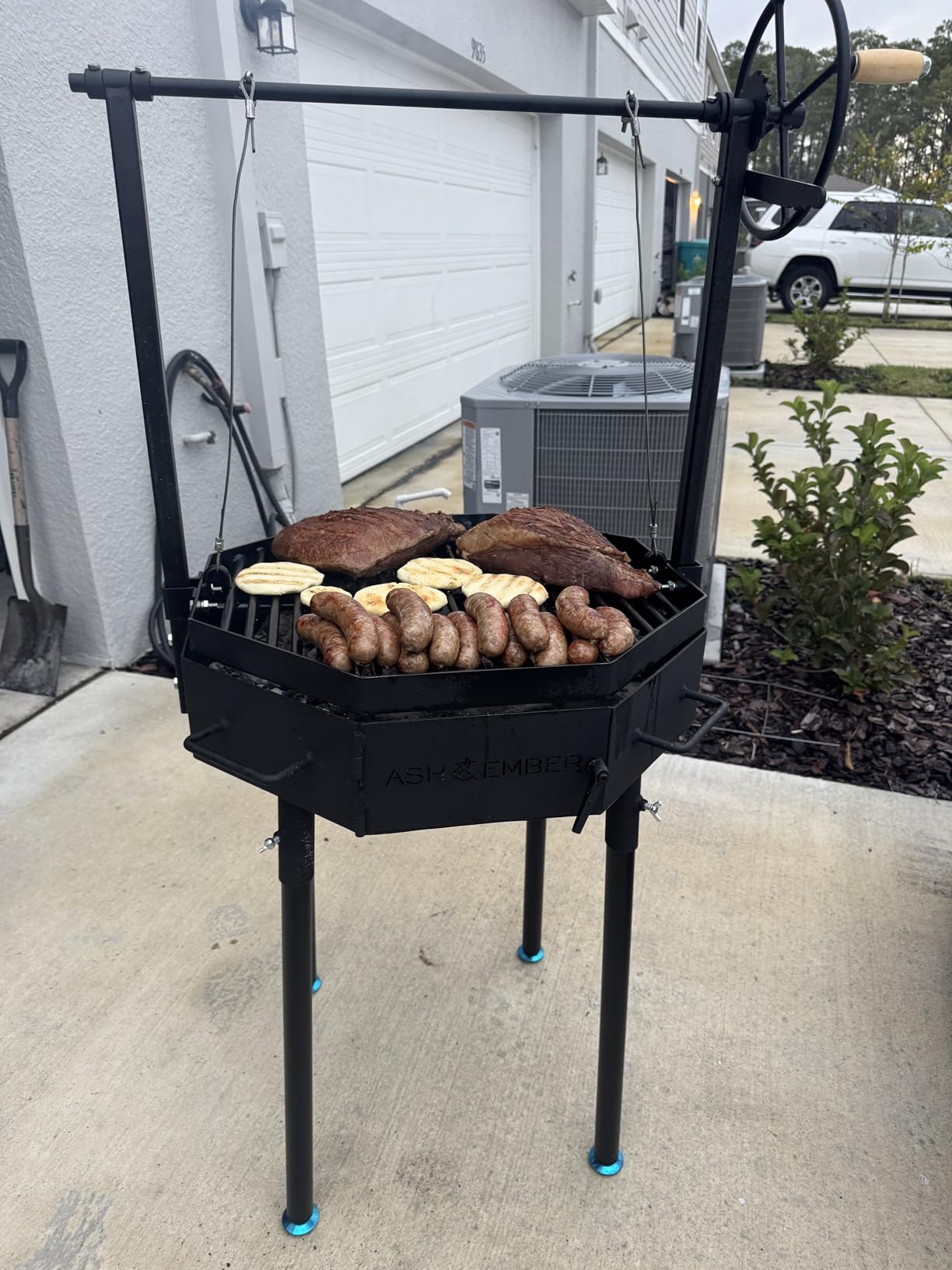 TITAN GREAT OUTDOORS Ash & Ember Santa Maria Grill, Argentine Style Open Fire Grill, Adjustable Cooking Grate with Flywheel customer photo 1