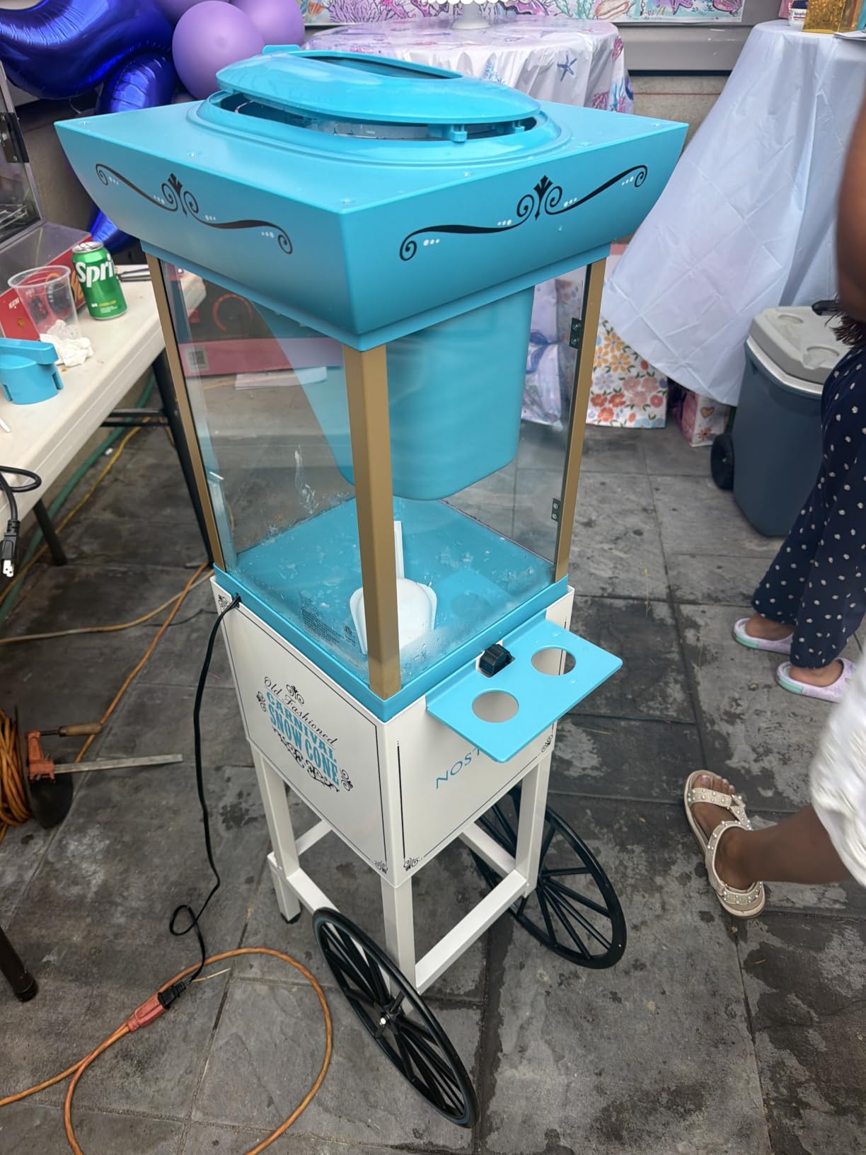 Nostalgia Snow Cone Shaved Ice Machine - Retro Cart Slushie Machine Makes 48 Icy Treats - Includes Metal Scoop, Storage Compartment, Wheels for Easy Mobility - White, Blue customer photo 2