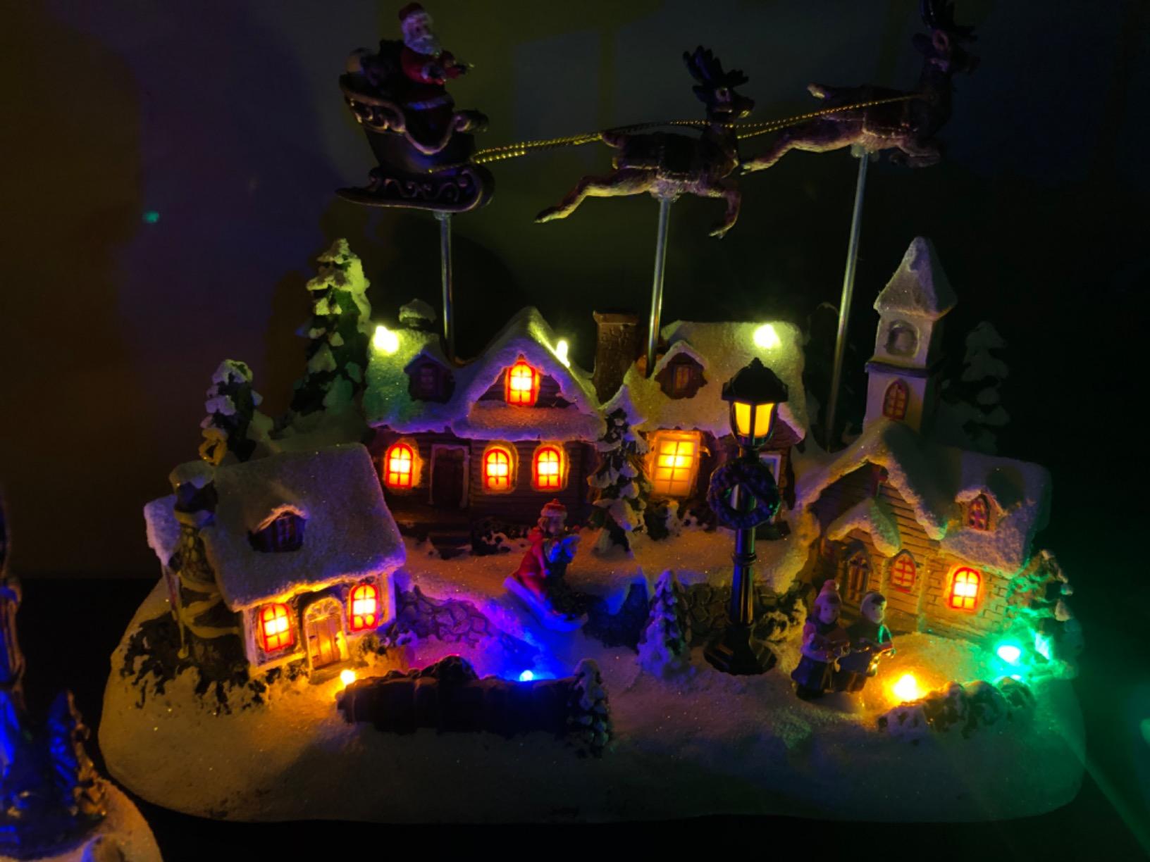 Kurt Adler Battery Operated Musical LED Village with Santa and Deer, 11-Inch customer photo 1