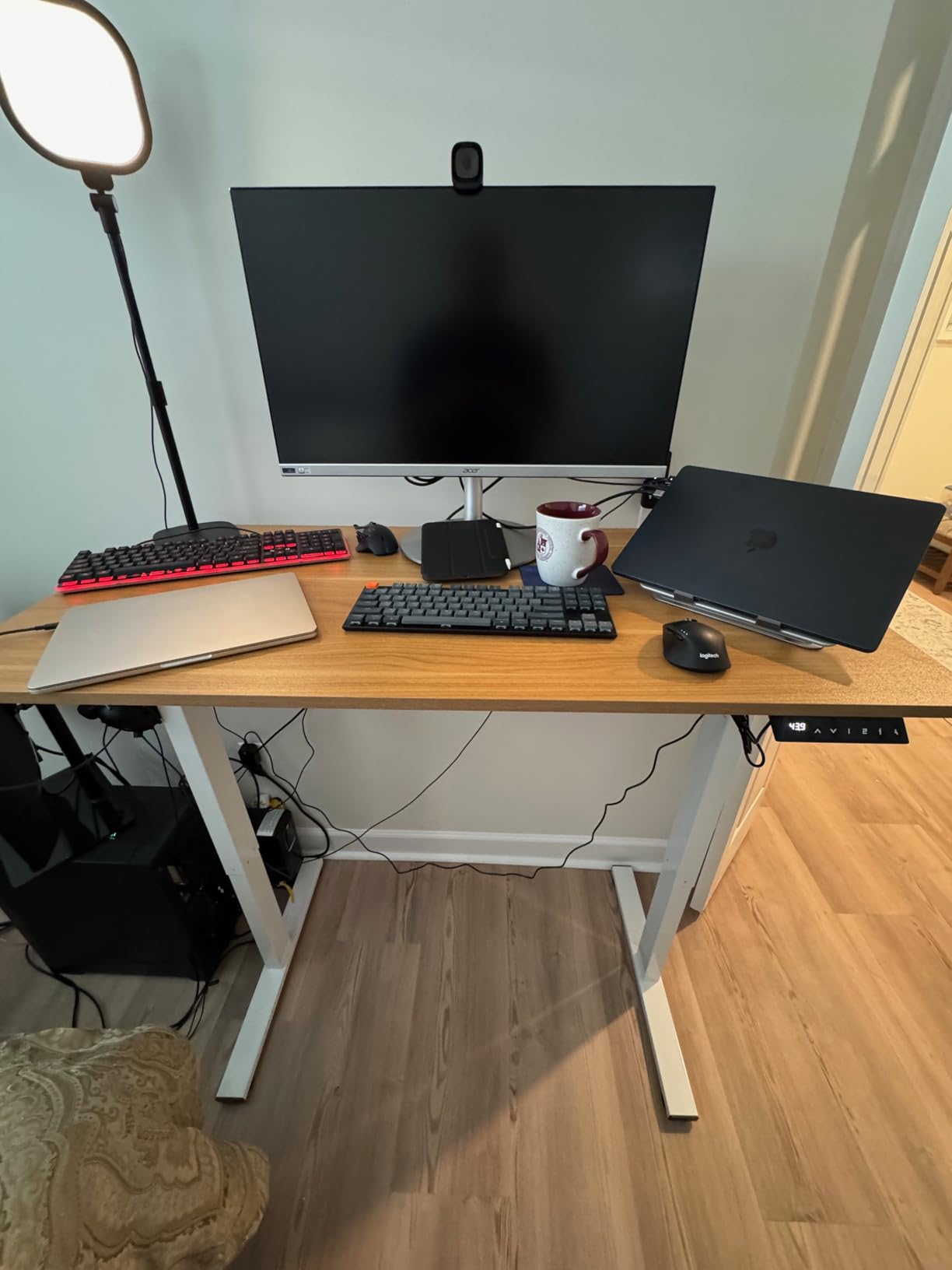FLEXISPOT EN1 One-Piece Standing Desk, Electric Adjustable with 4 Memory Presets, 176 LBS Capacity, Stable & Quiet, Seamless Desktop for Home Office & Dual Monitors, 48x24 Black customer photo 1