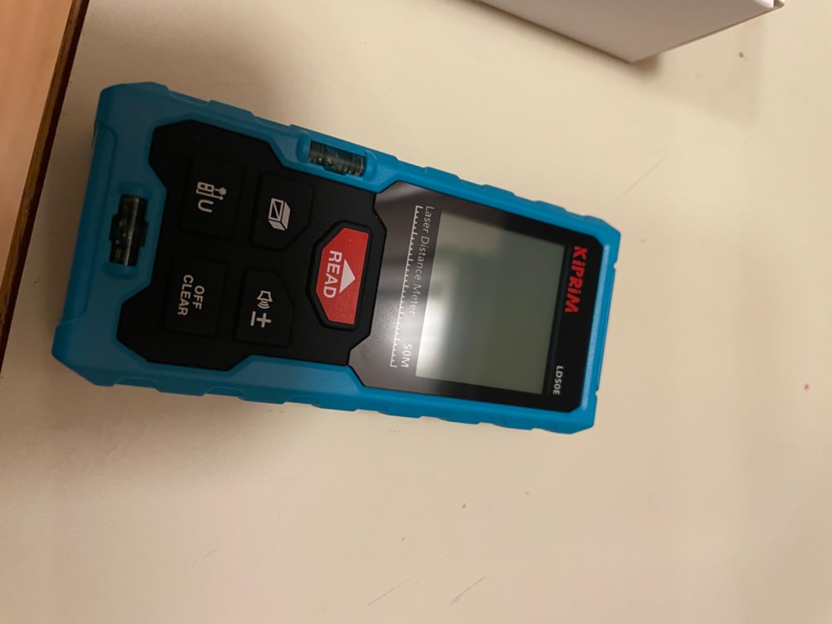 Kiprim Laser Distance Measure High Accuracy 165ft Kiprim LD50E Laser Tape Measure 50M Compact Laser Measurement Tool with Larger Backlit LCD Display, ft/m/in Switching, Bubble Level customer photo 1