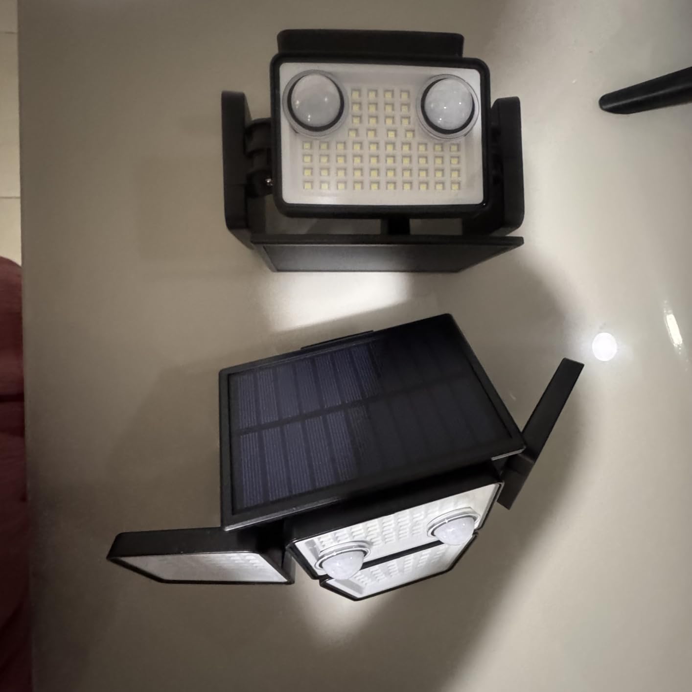 LYWALT Solar Outdoor Lights - 3000LM 188 LED Motion Sensor Outdoor Lights, 4 Heads Security Light,IP65 Waterproof, Easy Install,270°Wide Angle Flood Wall Light with 3 Modes for Backyard Yard (2 Pack) customer photo 2