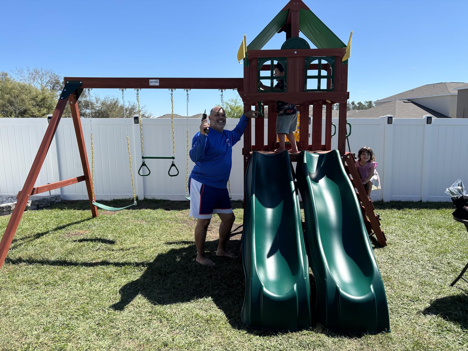 Gorilla Playsets 01-1057-GREY Playmaker Deluxe Wooden Swing Set with Dual Gray Wave Slides, Vinyl Canopy Roof, Swings, and Rock Climbing Wall, Redwood Stained Cedar (Amazon Exclusive) customer photo 1