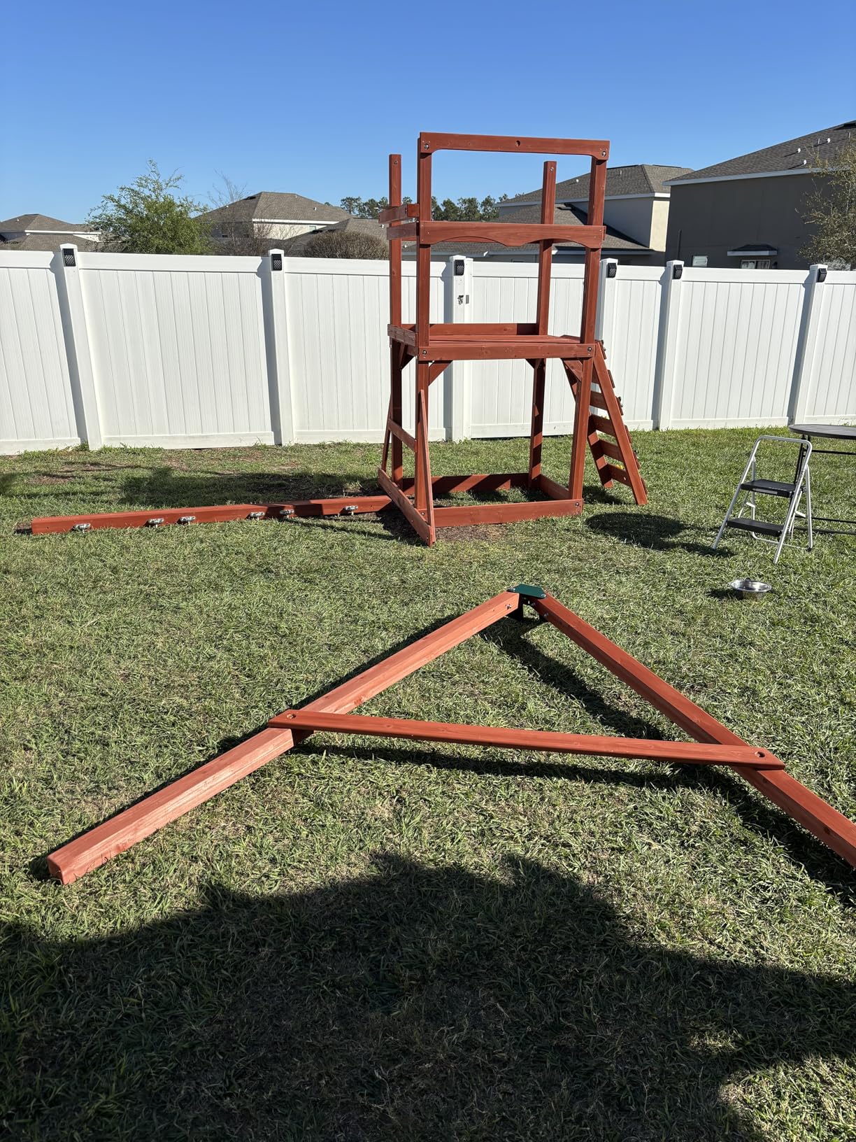Gorilla Playsets 01-1057-GREY Playmaker Deluxe Wooden Swing Set with Dual Gray Wave Slides, Vinyl Canopy Roof, Swings, and Rock Climbing Wall, Redwood Stained Cedar (Amazon Exclusive) customer photo 2