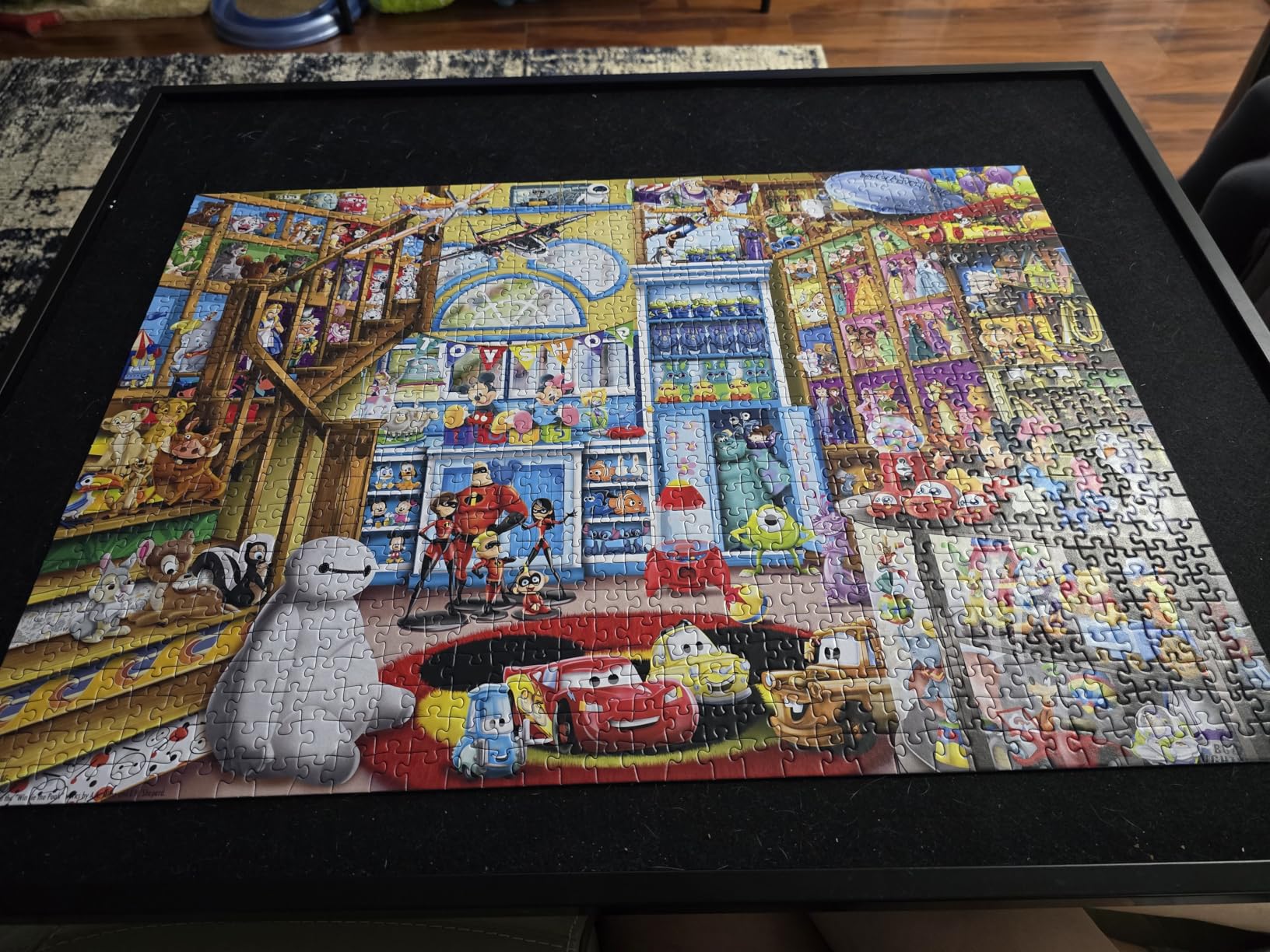 Ravensburger Disney & Pixar - 1000 Piece Jigsaw Puzzle - Stunning, Vivid Imagery of Favorites Mickey Mouse, Olaf & More - Toy Shop Scene - Ideal Gift - Frameable Art - Puzzles for Adults customer photo 1