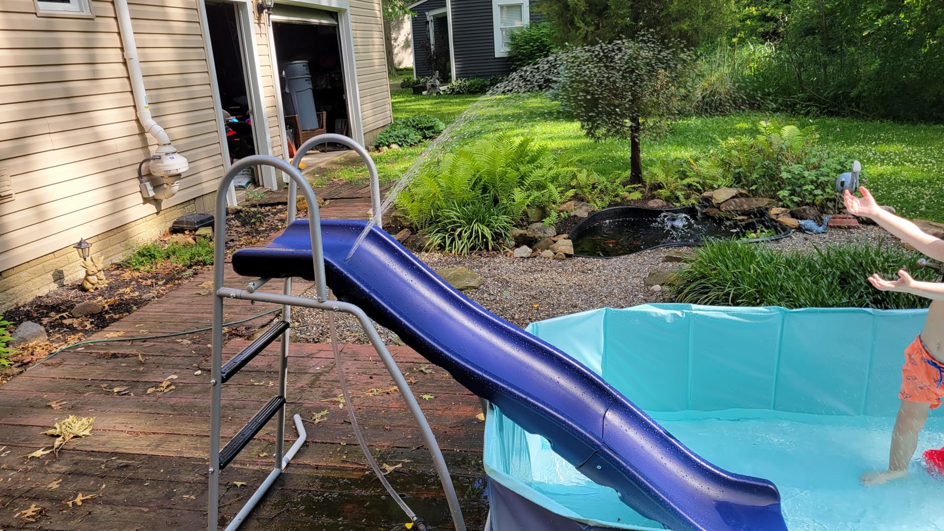XDP Recreation 6 Foot Water Wave Slide with Built in Adjustable Sprinkler, Freestanding with Ground Pad and Hose Extension for Lawn Fun, Ages 3 to 8 customer photo 1