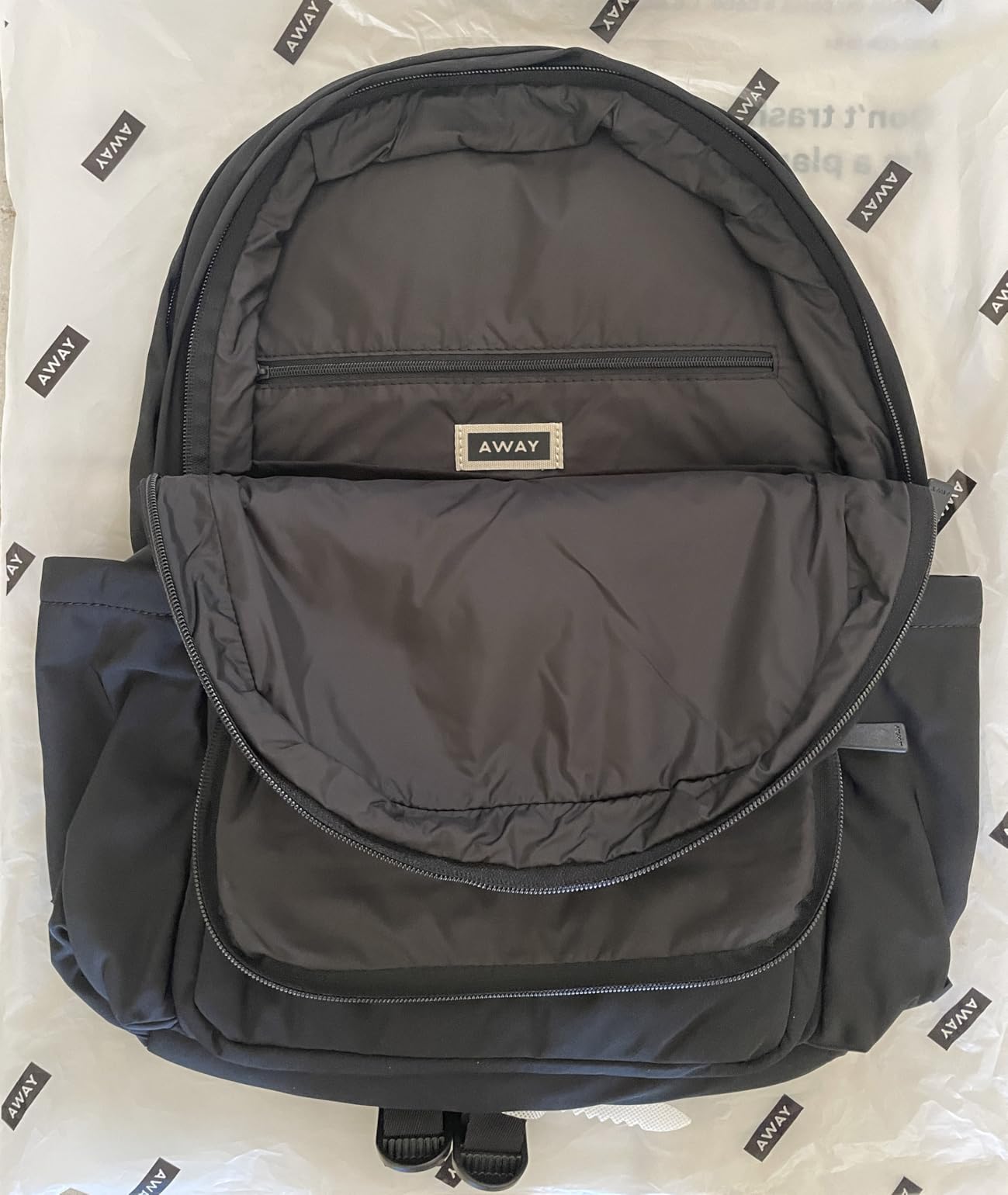 Featherlight Large Backpack for Travel & Work - Ergonomic Lightweight Bag with 16 Inch Laptop Sleeve, Passport Pocket & Trolley Sleeve, Jet Black customer photo 1