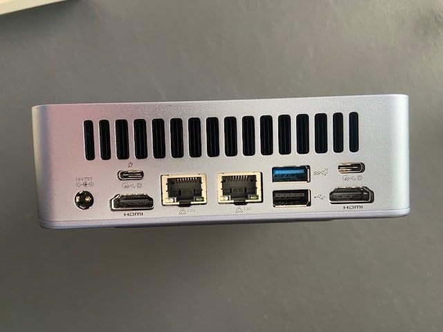 GEEKOM AX8 Max Silent Operation Mini PC for Office/Multitasking/NAS, AMD Ryzen 7 8745HS, 16GB DDR5, 1TB SSD, Windows 11 Pro, Radeon 780M, USB4.0, Dual 2.5GbE LAN, 8K Quad Display customer photo 1