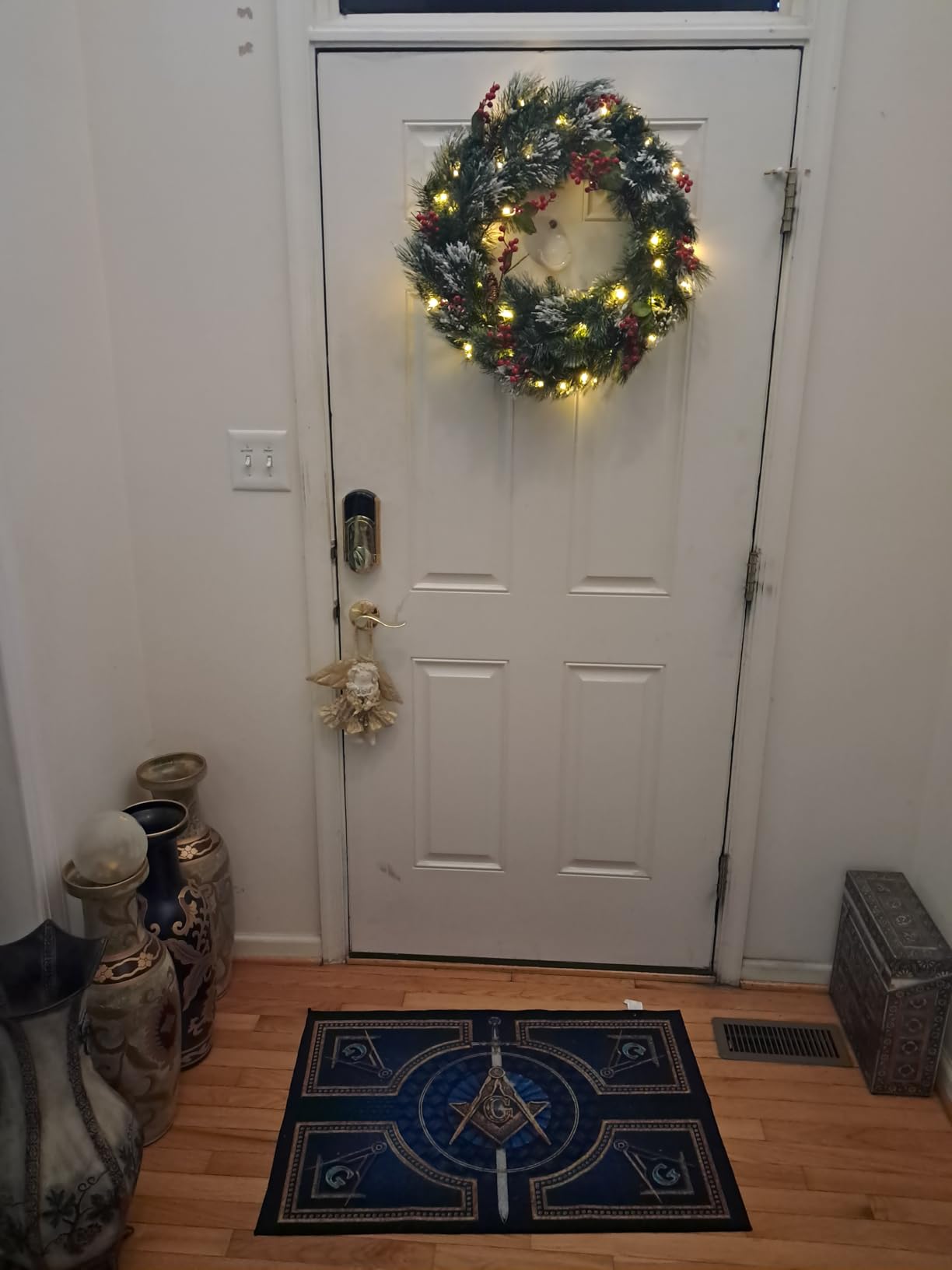 National Tree Company 24 in Pre-Lit Wintry Pine Flocked Artificial Christmas Wreath with Pinecones, Red Berries, 50 Clear LED Lights, 113 Tips, Timer customer photo 1