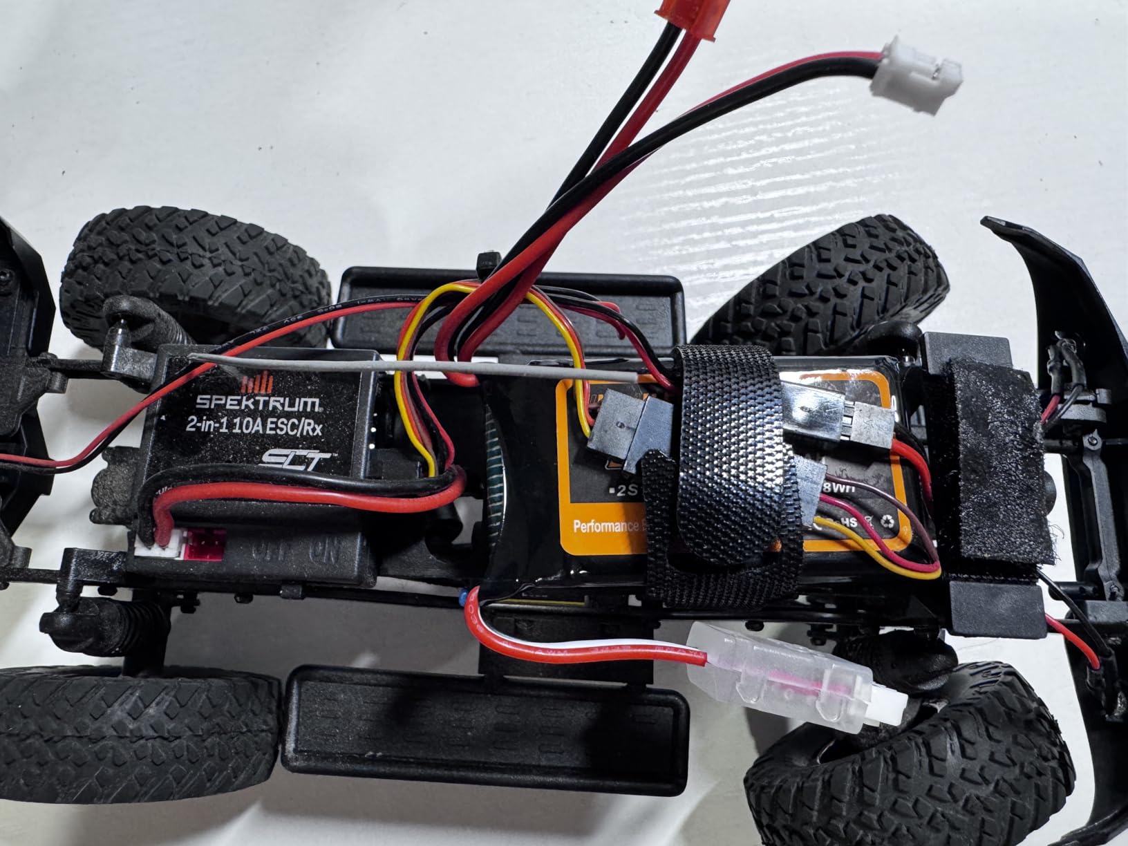 SCX24 Battery 7.4V 1200mAh Lipo Battery 2S 35C (Burst 70C) with PH2.0 JST Plug with 1TO2 USB Charger Fit for SCX24 RC Car WLtoys A949 A959 A969 A979 K929 and Most 1/10 1/16 1/18 1/24 RC Truck customer photo 2
