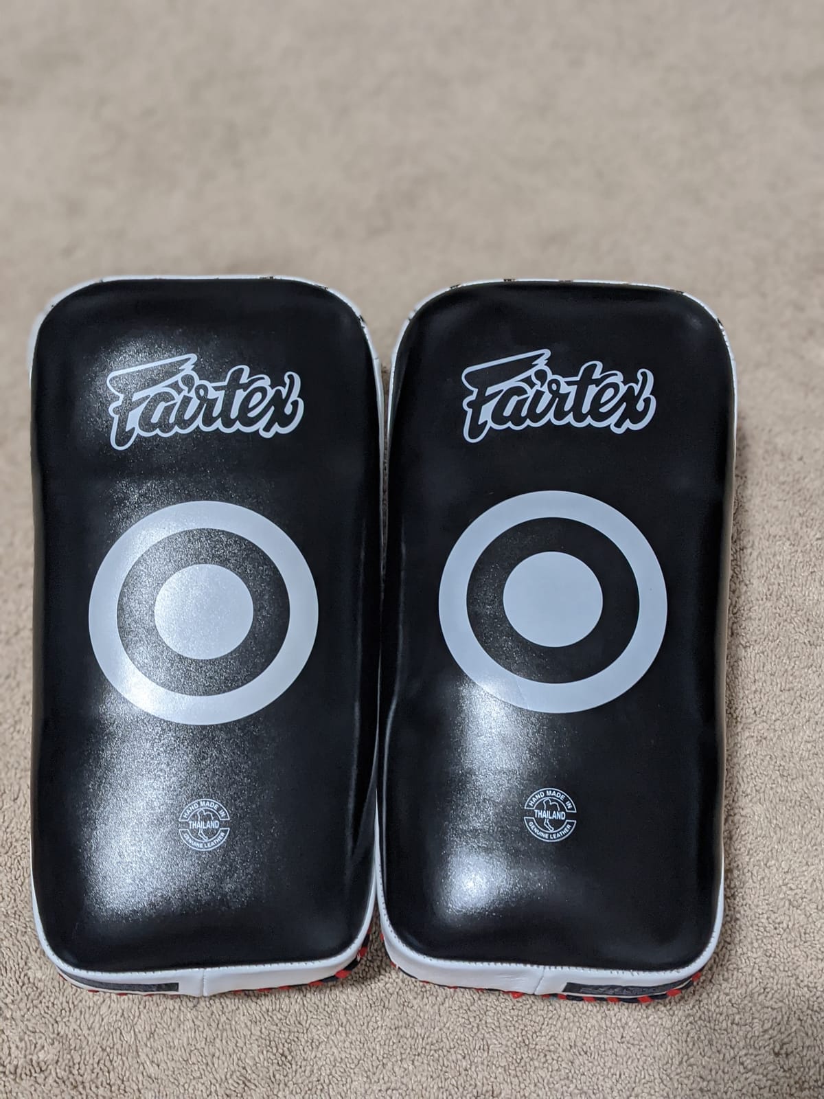 Fairtex Curved Muay Thai Pads, Kickboxing Punching Kicking Striking Shield | Handcrafted cowhide leather with thick foam. Dual forearm support straps assist trainer holding during self-defense drills customer photo 1