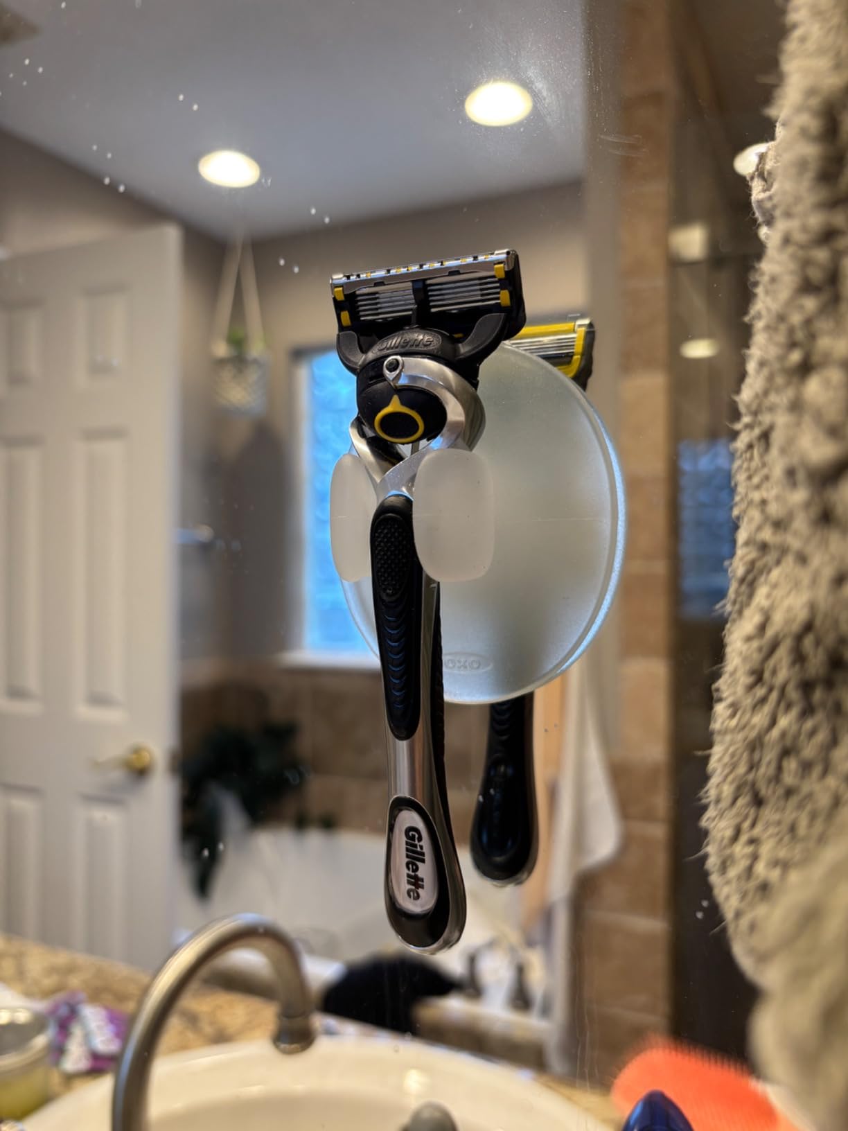 OXO Good Grips Suction Razor Holder | Attaches to Shower Wall, Holds Razors Upright, Ventilated for Drying, Ideal for the Shower customer photo 1