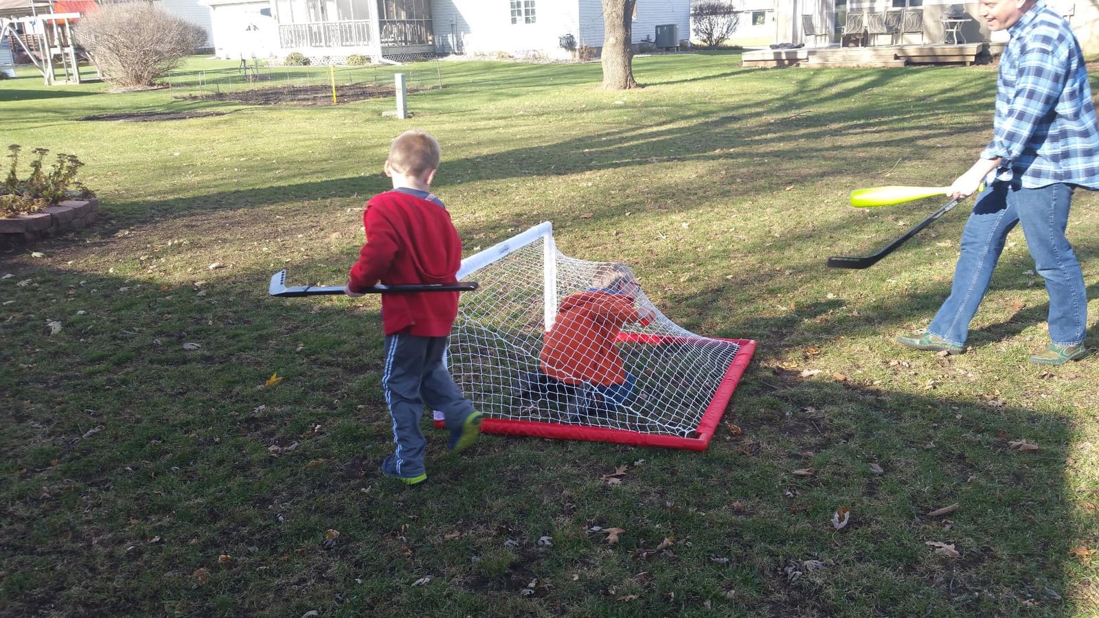 Franklin Sports Hockey Goal, Ball, and Stick Set - NHL | Driveway Fun for Beginners, Complete Starter Kit, Lightweight PVC Frame, Durable Pre-Fit Netting, For Junior Players customer photo 2