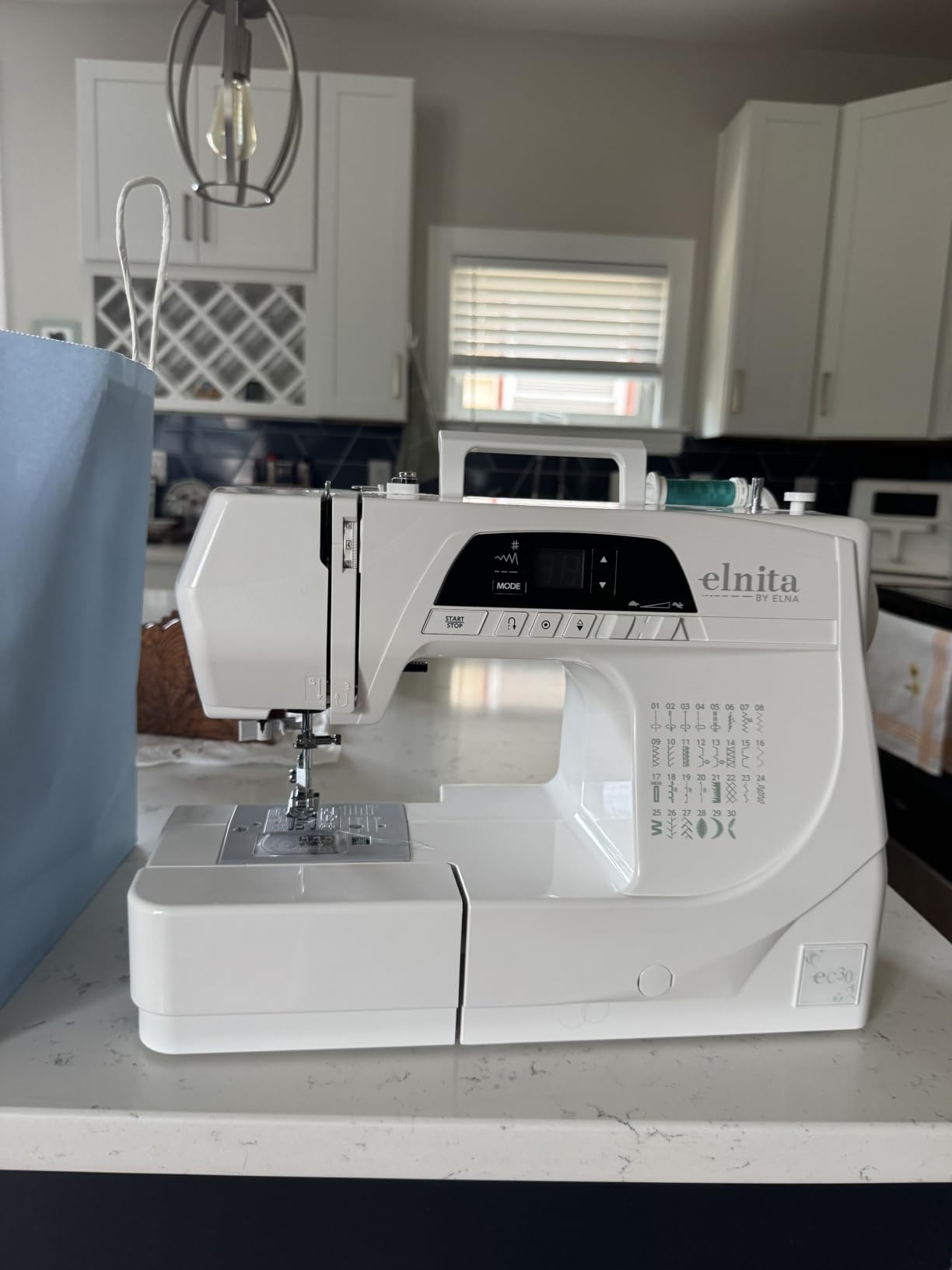 Elnita EC30 Computerized Sewing Machine with 30 Stitches, LED Display, Needle Threader, Locking Stitch, Start/Stop Button and Foot Control; Lightweight and portable for home customer photo 1