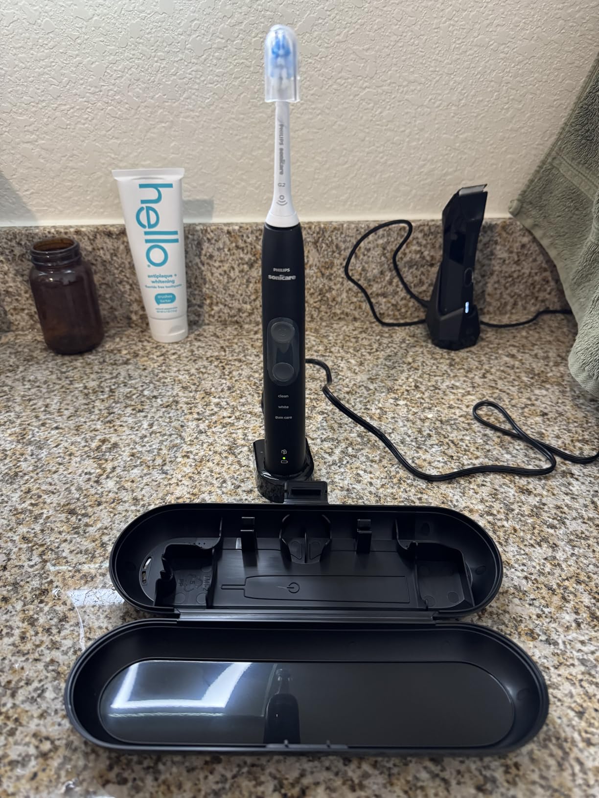 Philips Sonicare 5300 Rechargeable Electric Toothbrush, 3 Brush Head, Black | 700% More Plaque Removal, Visual Pressure Sensor, 3 Brush Settings, 14-Day Battery, Travel Case, HX6423/34 customer photo 2