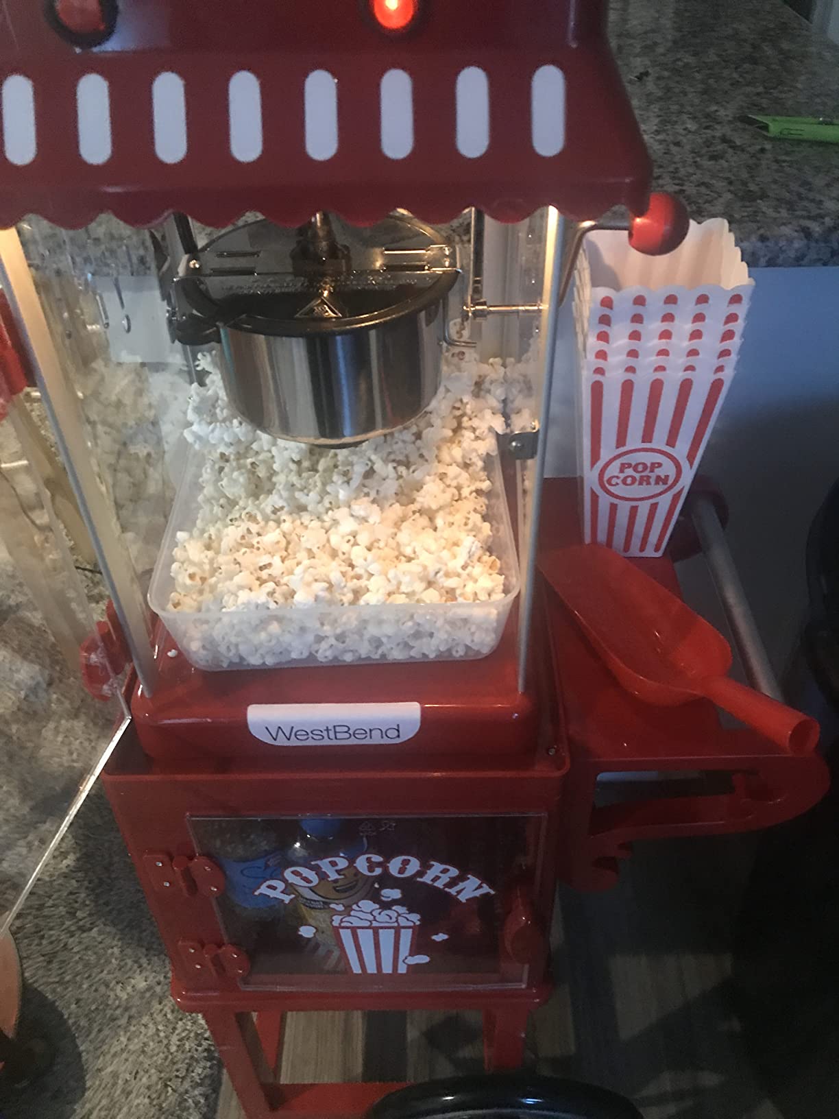 West Bend Popcorn Popper Machine Theater Style on Wheeled Cart with Non-Stick 2.5 Oz Stainless Steel Popcorn Kettle, Storage Shelf, and Popcorn Scoop, 10-Cup, Red customer photo 1