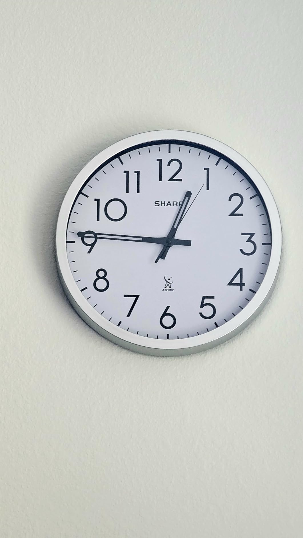 Sharp 12-Inch Atomic Wall Clock, Battery Powered, Grey Face Silver Frame customer photo 1