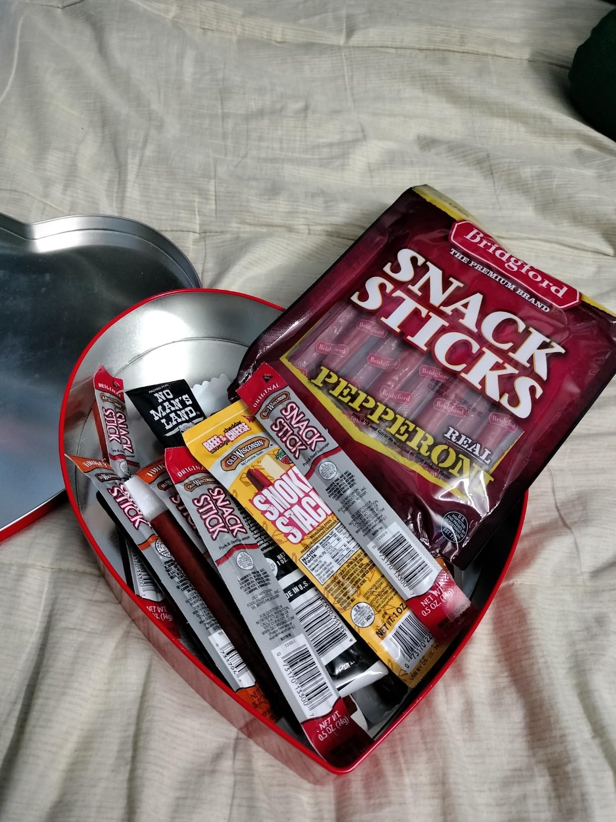 ManSnacks Deluxe Jerky & Nuts Gift Basket for Men - 28 pc - Large Variety of Beef Jerky Sticks, Pepperoni Sticks, Cheese Sticks, Almonds, Peanuts & Pistachios, in a Manly Gift Bag customer photo 1