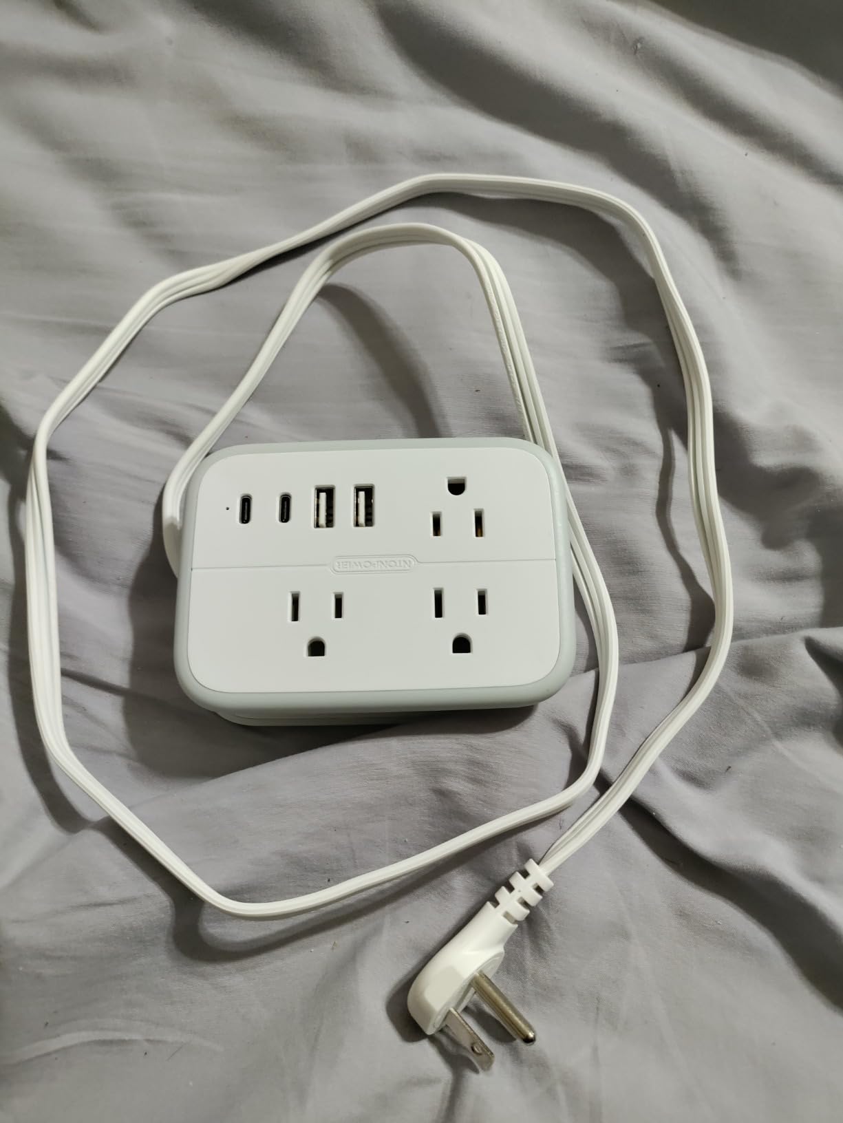 NTONPOWER 10 in 1 Travel Power Strip, 6 Outlets 4 USB Ports(2 USB C), 4ft Extension Cord Wrapped Around Small Power Strip, Compact for Travel, Hotel, Cruise Approved, White customer photo 2