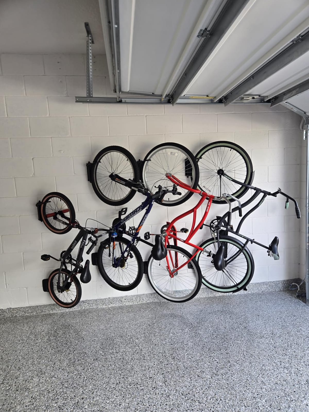 monTEK Swivel Bike Wall Mount, Bike Hangers for Garage, 4 Pack | Heavy-duty vertical wall bike storage rack swivels 150 degrees to save space; holds 66 lb each and fits tires up to 3.54 in wide customer photo 1