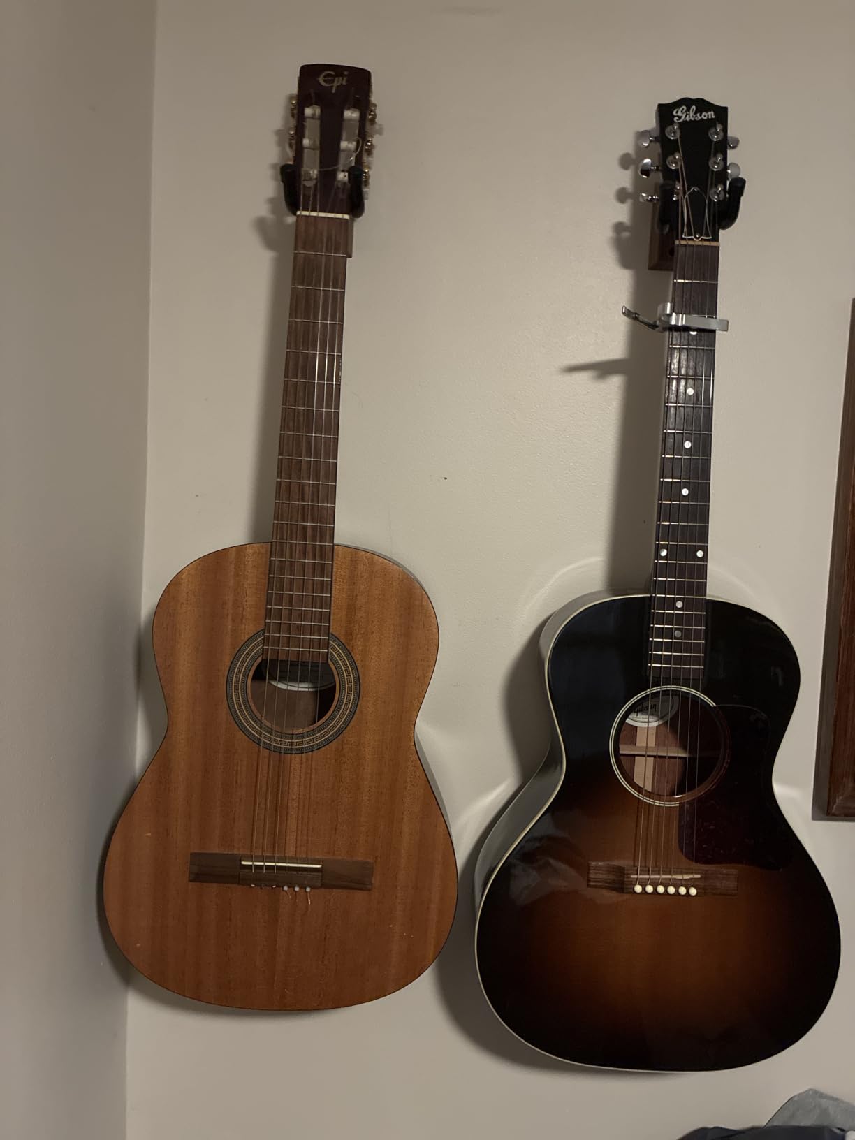 Guitar Wall Hanger 2 Pack U-Shaped Walnut Mount | Black walnut hardwood, auto-pivoting yoke, nitro-safe padding, 35 lb capacity, 6 picks and hardware included customer photo 1