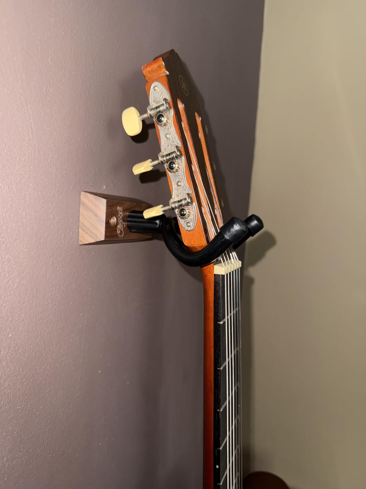 Guitar Wall Hanger 2 Pack U-Shaped Walnut Mount | Black walnut hardwood, auto-pivoting yoke, nitro-safe padding, 35 lb capacity, 6 picks and hardware included customer photo 2
