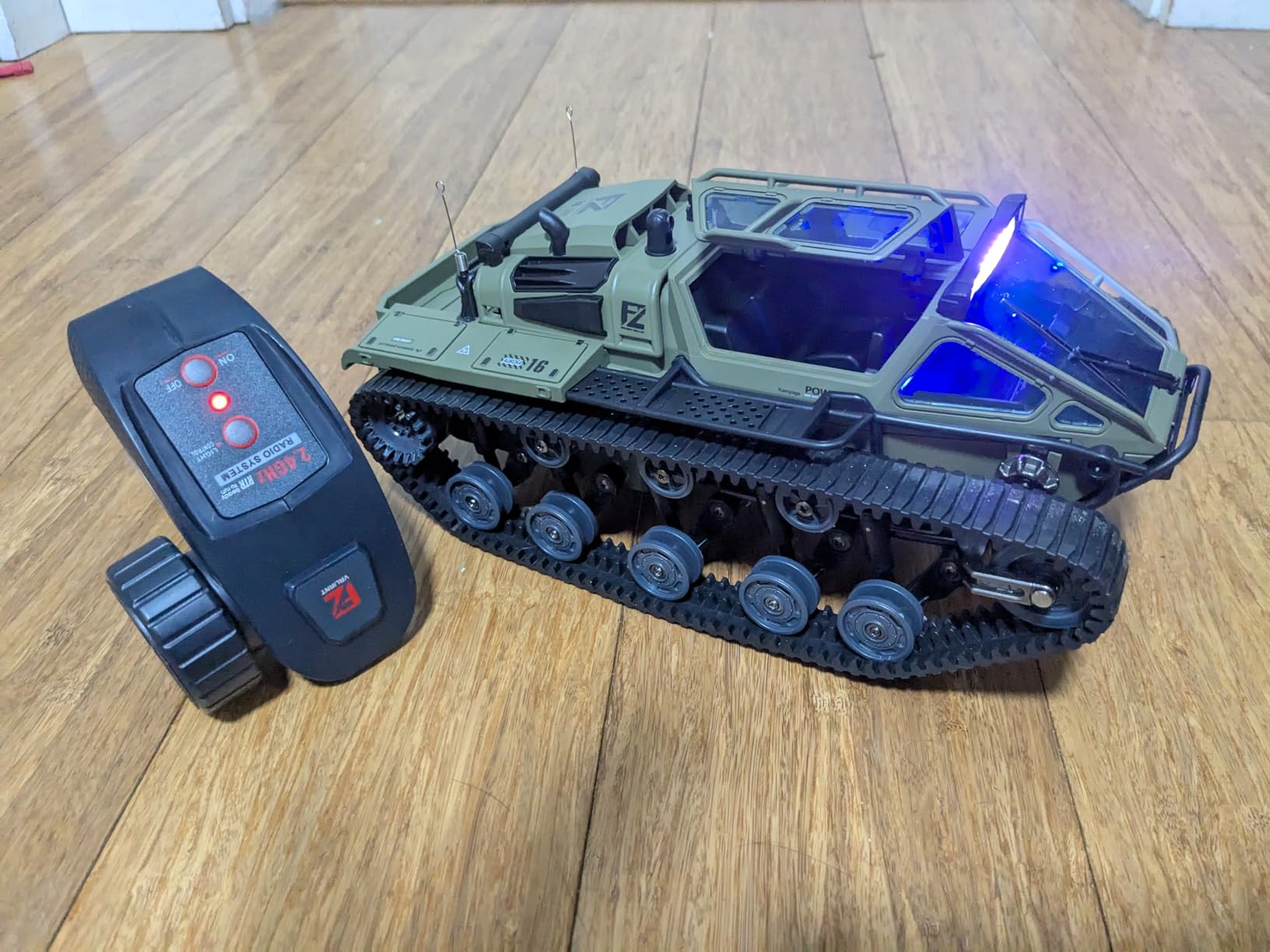 RC Tank All Terrain Army Truck for Kids - 2.4G Fully Proportional Remote Control Military Vehicle with 2 Batteries, Rock Crawler 4WD 360°Rotating Drifting Car with Cool Lights, Great Gift for Boys customer photo 2