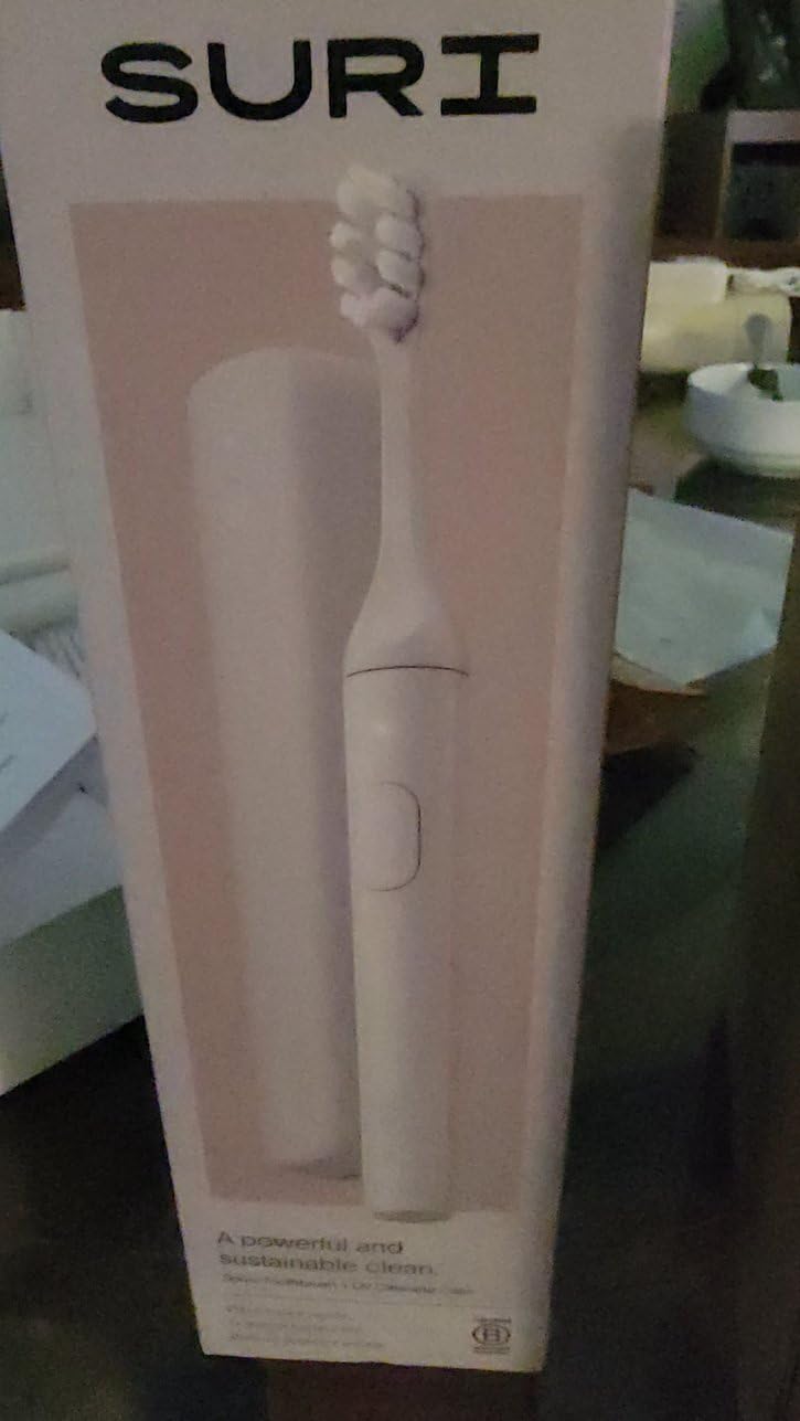 SURI Pro Sonic Electric Toothbrush | Over 4+ Weeks Battery | UV Cleaning Travel Case | Pressure Sensor | Aluminium Body | 2-Minute Timer | Plant-Based Heads | Green customer photo 1