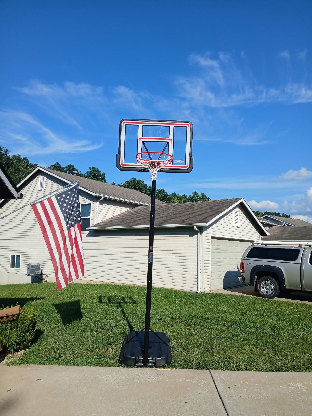 Lifetime NBA League Edition Portable Basketball Hoop, Adjustable Height 7.5-10 Ft, 44 Inch Shatterproof Polycarbonate Backboard, Steel Frame, Black/Clear customer photo 2