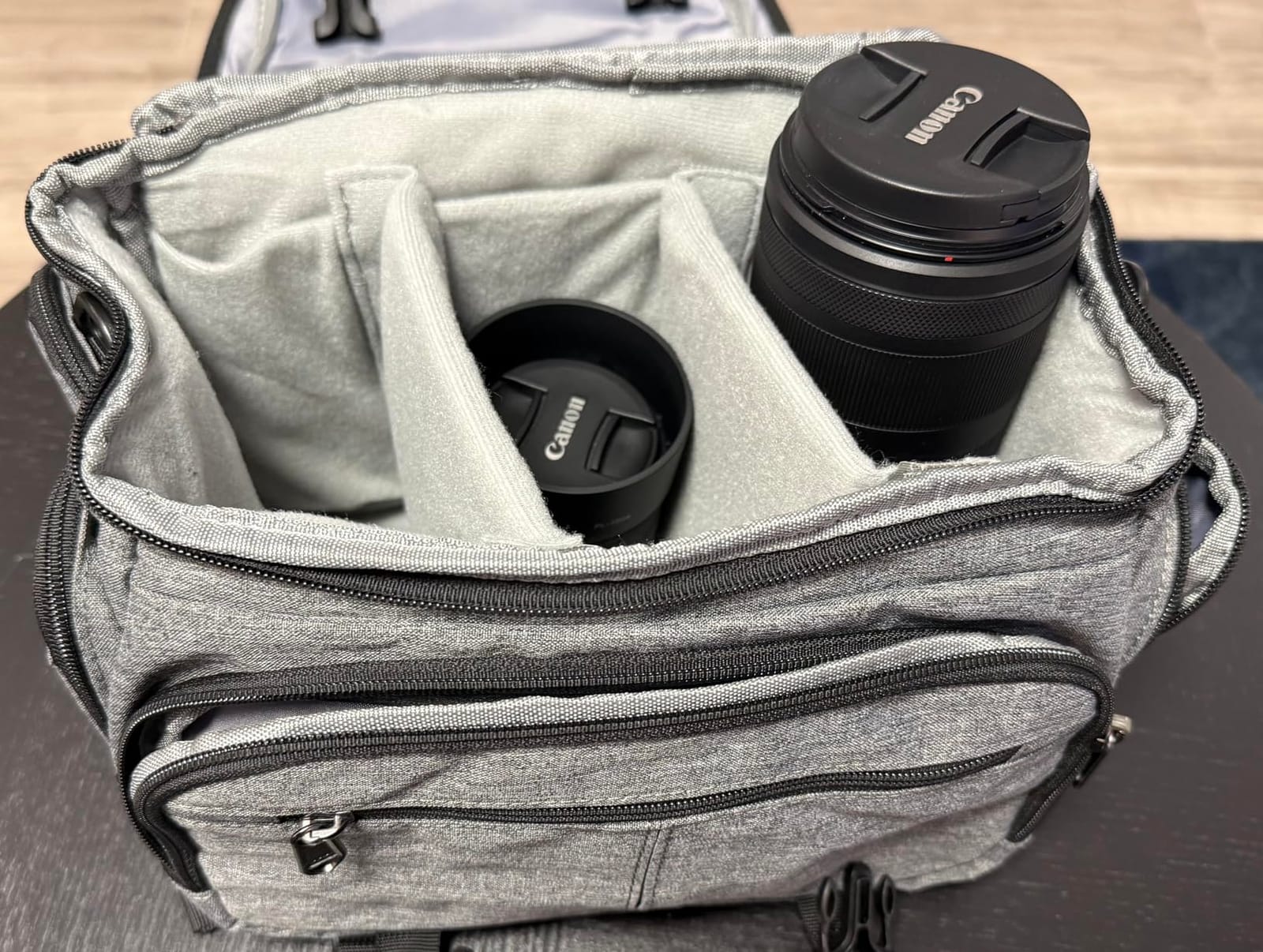 RAINSMORE Camera Bag, DSLR/SLR/Mirrorless Camera Sling Bag for Photographers Waterproof Small Camera Case with Tripod Holder & Rain Cover Camera Crossbody Bag for Canon/Nikon/Sony/Fuji, Black customer photo 2