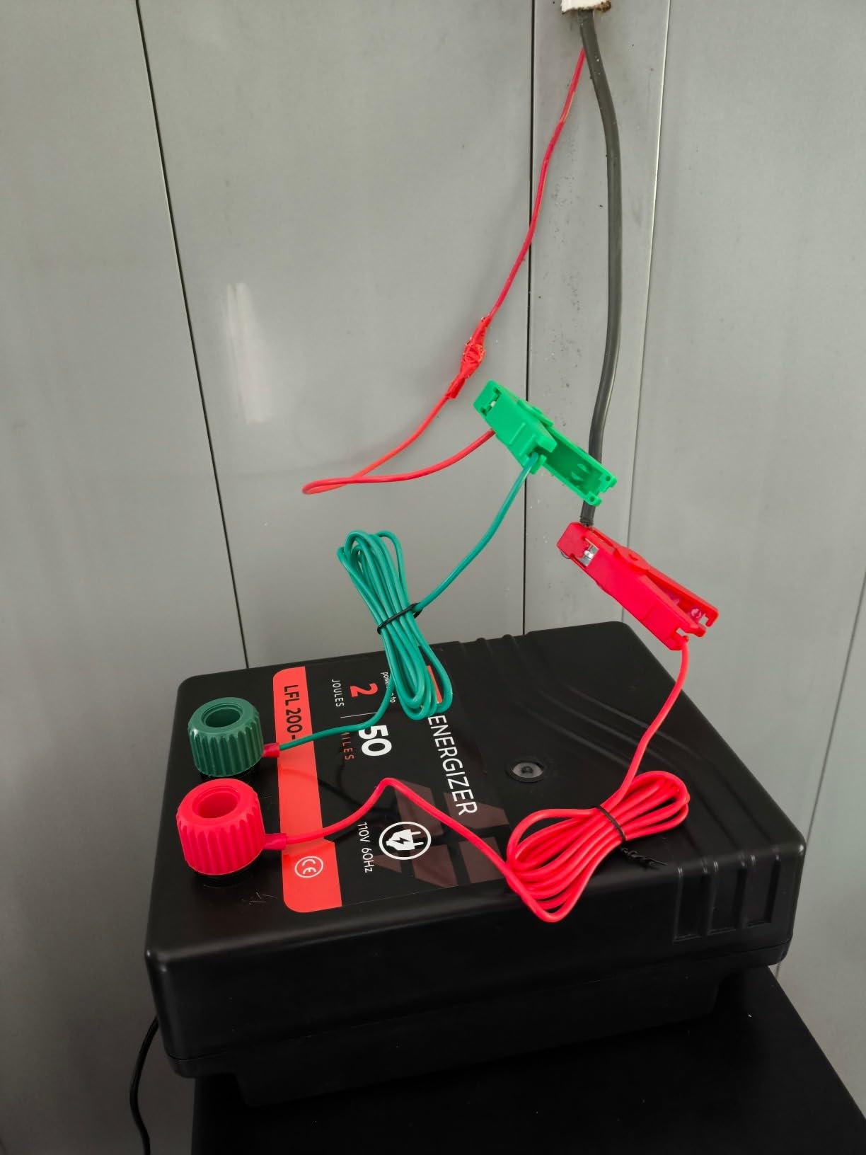 Electric Fence Charger AC Powered 100 Miles 300 Acres, 110 Volt 6.7 Joule Plug-in Electric Fence Energizer, Output Voltage Max 10.2 kV for Livestock, Preventing Predators from Intruding customer photo 2