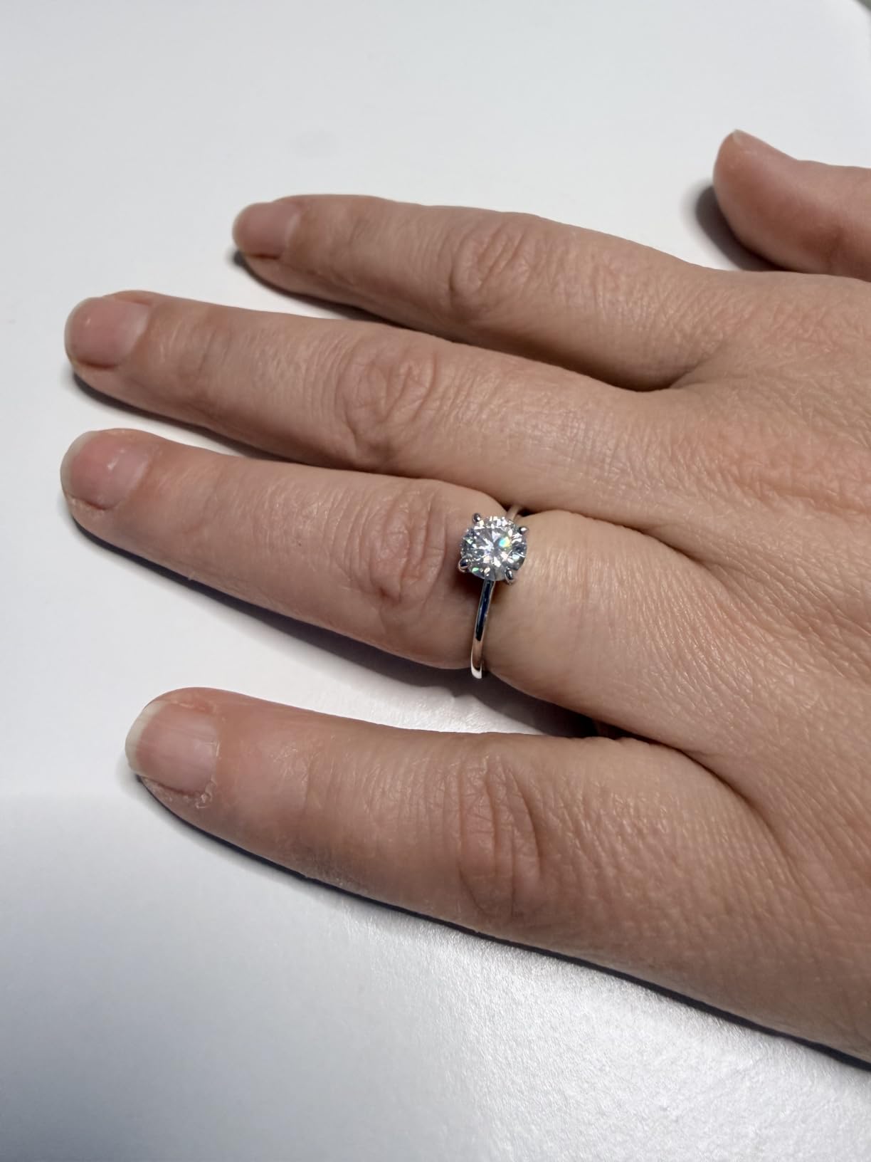 1CT Solitaire Moissanite Engagement Ring - Hypoallergenic 925 Sterling Silver with 14K White Gold Plated Round Cut D Color VVS1 Clarity Moissanite Ring customer photo 1