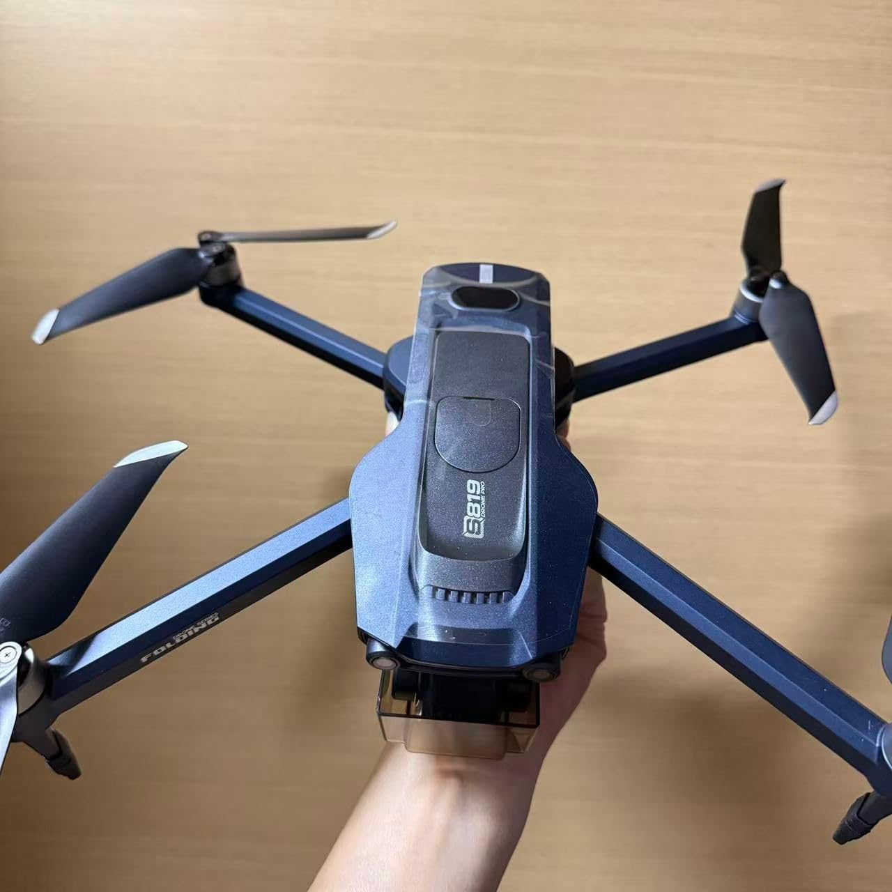Foldable FPV Quadcopter Airdrop Drone, 4-Way Obstacle Avoidance, 2.7K 3-Axis Gimbal Dual Cameras, GPS & Optical Flow Positioning System, Smart Follow, Brushless Motor, 4.92-Inch Touchscreen Remote Controller, 2 Batteries for 50 Mins Flight, Max 0.66 Lbs Payload Capacity, Suitable for Adults and Beginners customer photo 1