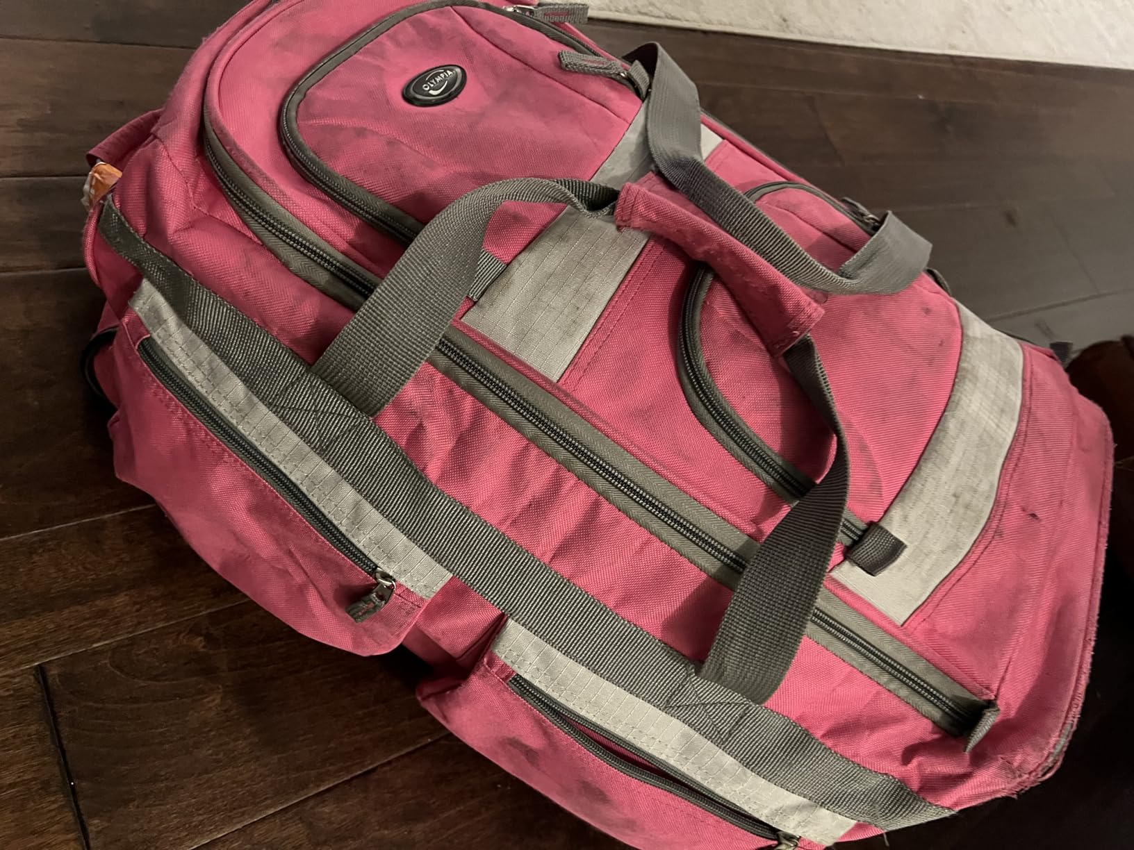 Olympia U.S.A. 22 inch Carry On 8 Pockets Wheeled Rolling Duffel Bag Water Resistant Luggage Lightweight Travel Suitcase with Retractable Handle customer photo 1