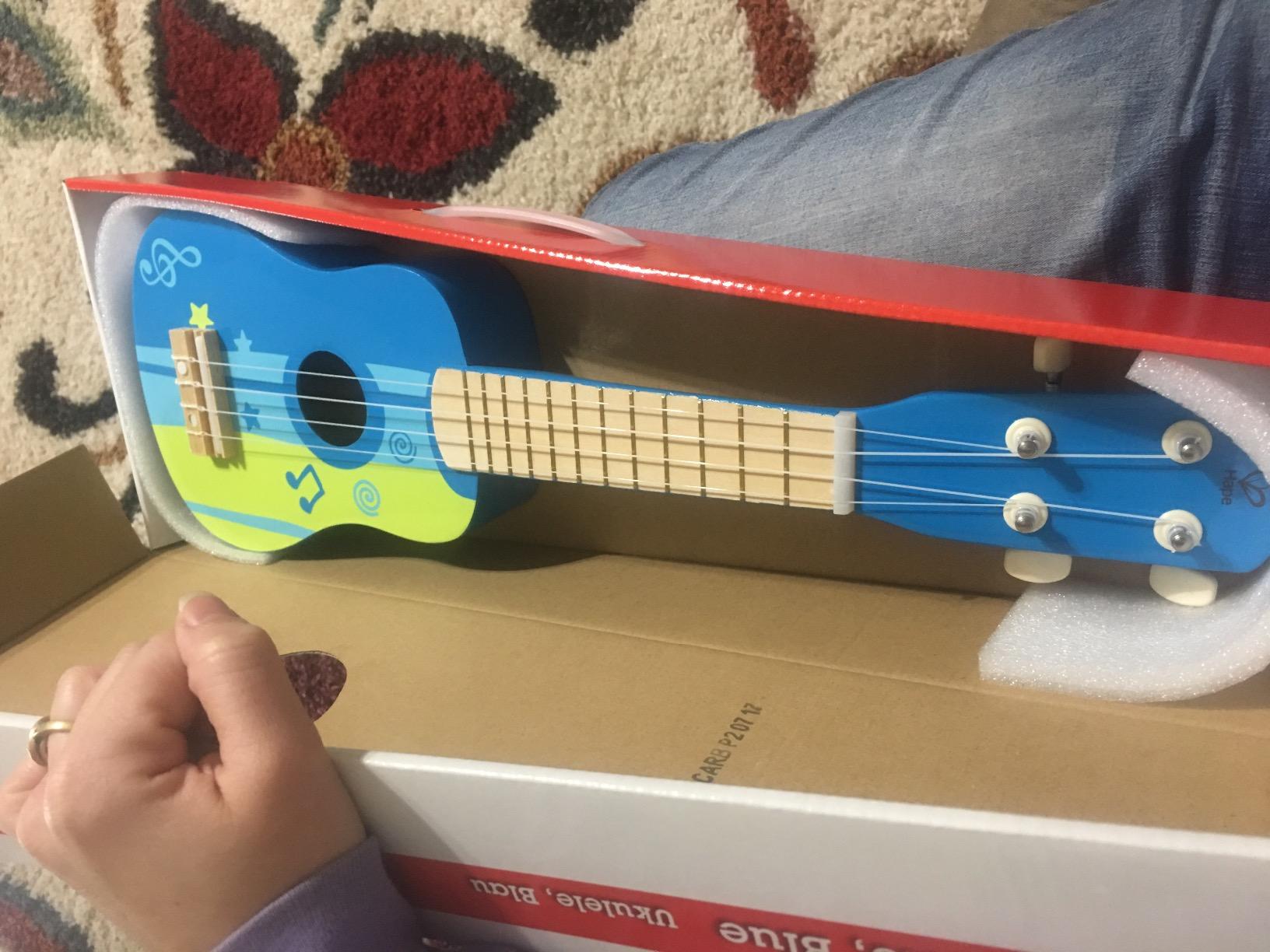 Hape Kid's Wooden Toy Ukulele, Red customer photo 1