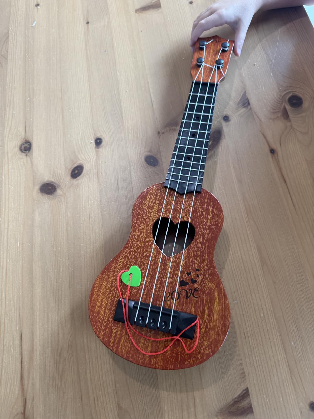 YEZI Kids Toy Classical Ukulele Guitar Musical Instrument for Kids | Mini Guitar Toy with Pick, Educational Musical Instrument for Preschool Boys Girls, Early Learning Music Toy for Ages 3+ customer photo 2