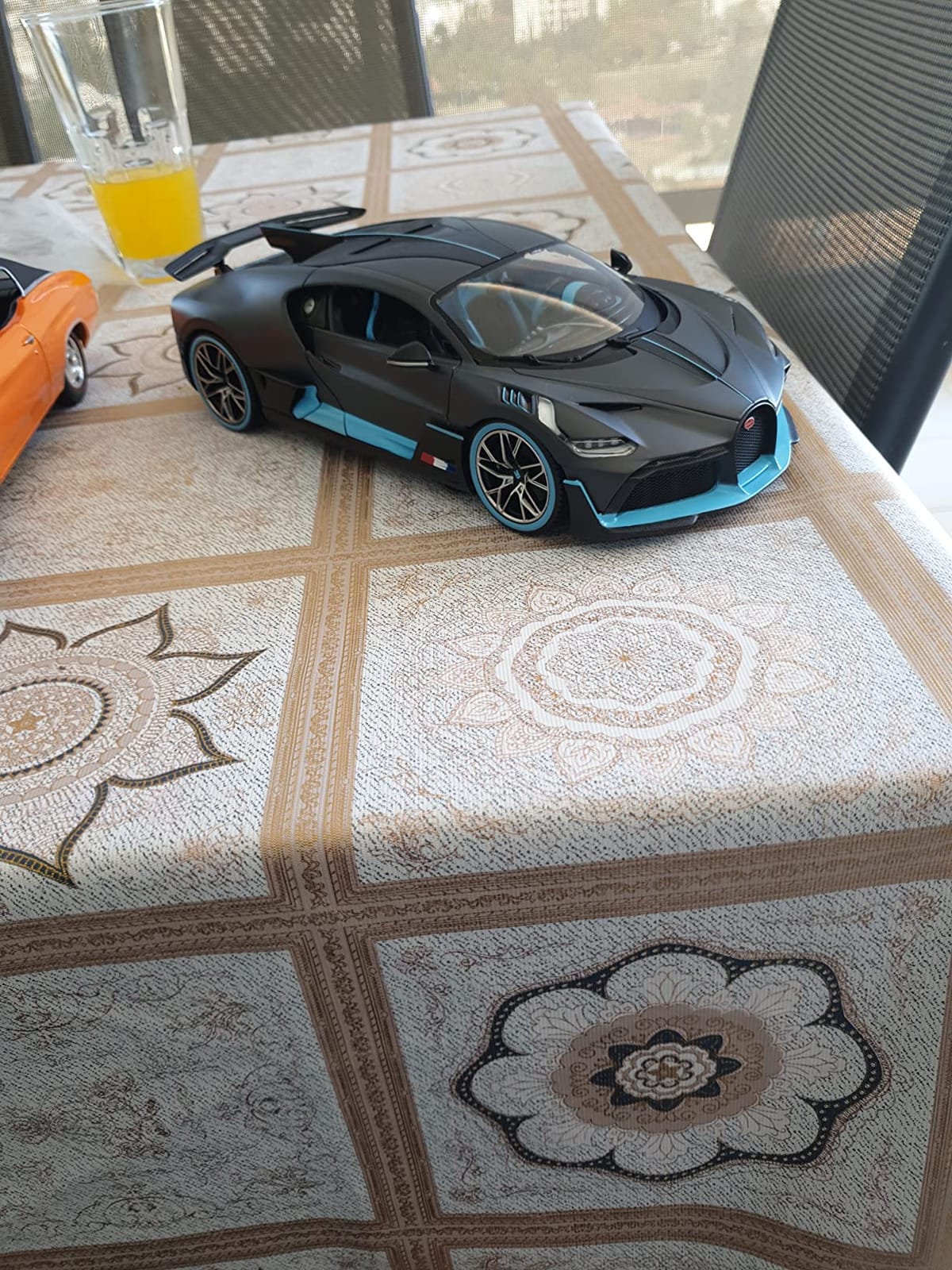 Bugatti Divo Matt Gray with Blue Accents 1/18 Diecast Model Car by Bburago 11045 customer photo 2