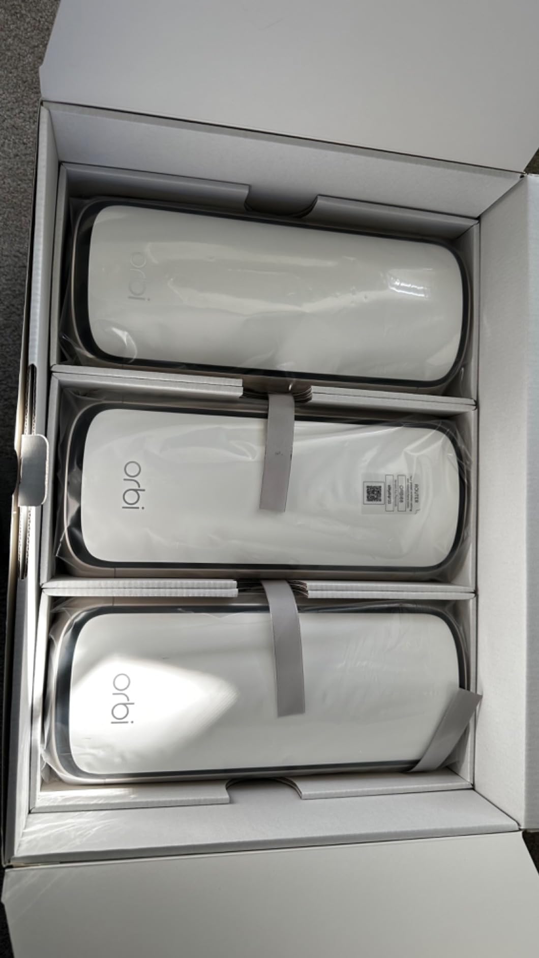 NETGEAR Orbi 970 Series Quad-Band WiFi 7 Mesh Network System (RBE973S), Router + 2 Satellite Extenders, Security Features, Up to 27Gbps, Covers Up to 10,000 sq. ft., 200 Devices, 10 Gig Internet Port customer photo 2