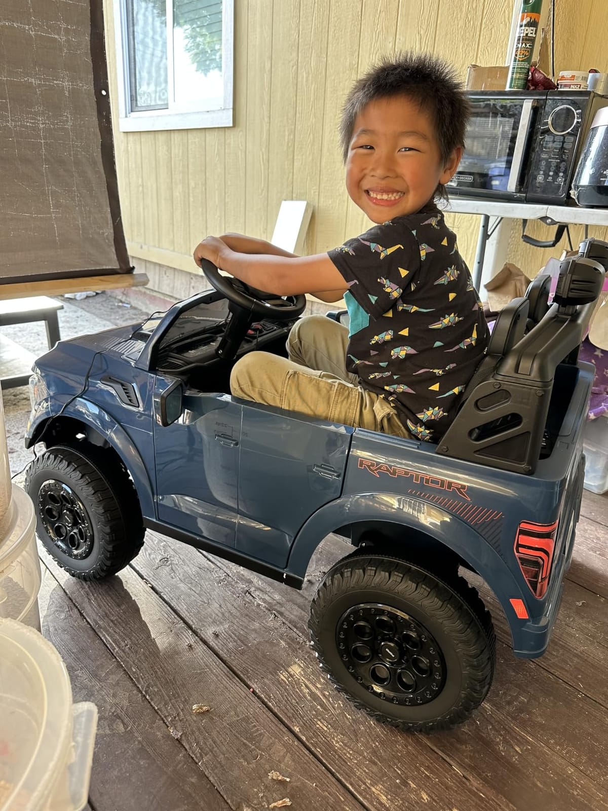 First Ride On 24V Kids Ride On Truck, Licensed Ford F-150 Raptor 2 Seater Electric Car w/Remote Control, Toddler Ride On Car Toys w/LED Lights, Bluetooth, Music, Truck Bed Storage, Soft Start (White) customer photo 2