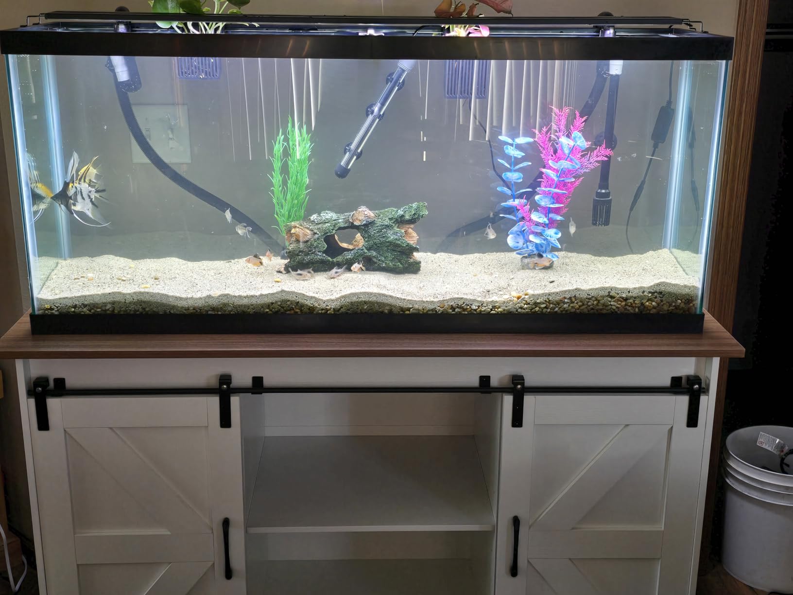 OtterOasis 55-75 Gallon Fish Tank Stand with Power Outlet & Adjustable Shelf, Heavy Duty Aquarium Stand with Cabinet Storage for Fish Tank, Turtle Tank, Reptile Terrarium, 1000LBS Capacity, White customer photo 2