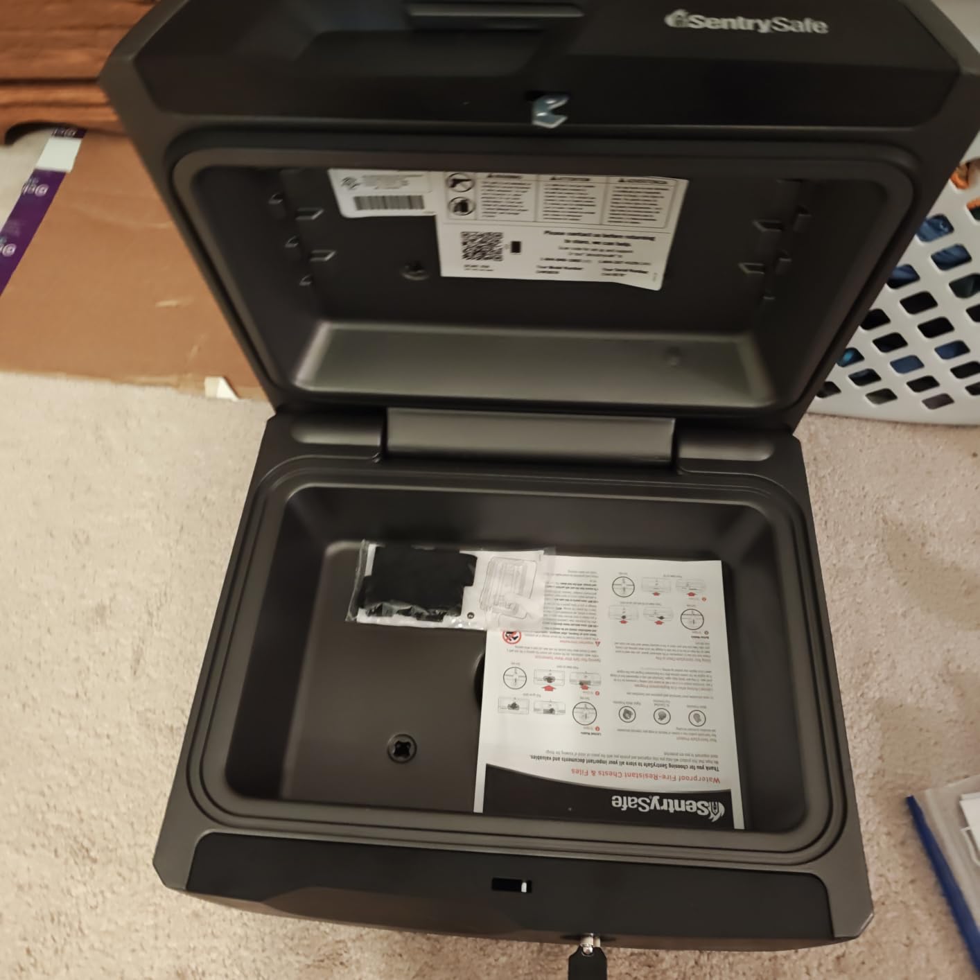 SentrySafe Fireproof and Waterproof Document Safe with Key Lock, Lock Box for Cash, Passport, Jewelry, Exterior: 16.5 in W x 14.8 in D x 7.6 in H, Black, 0.36 Cubic Feet, CHW30220 customer photo 1